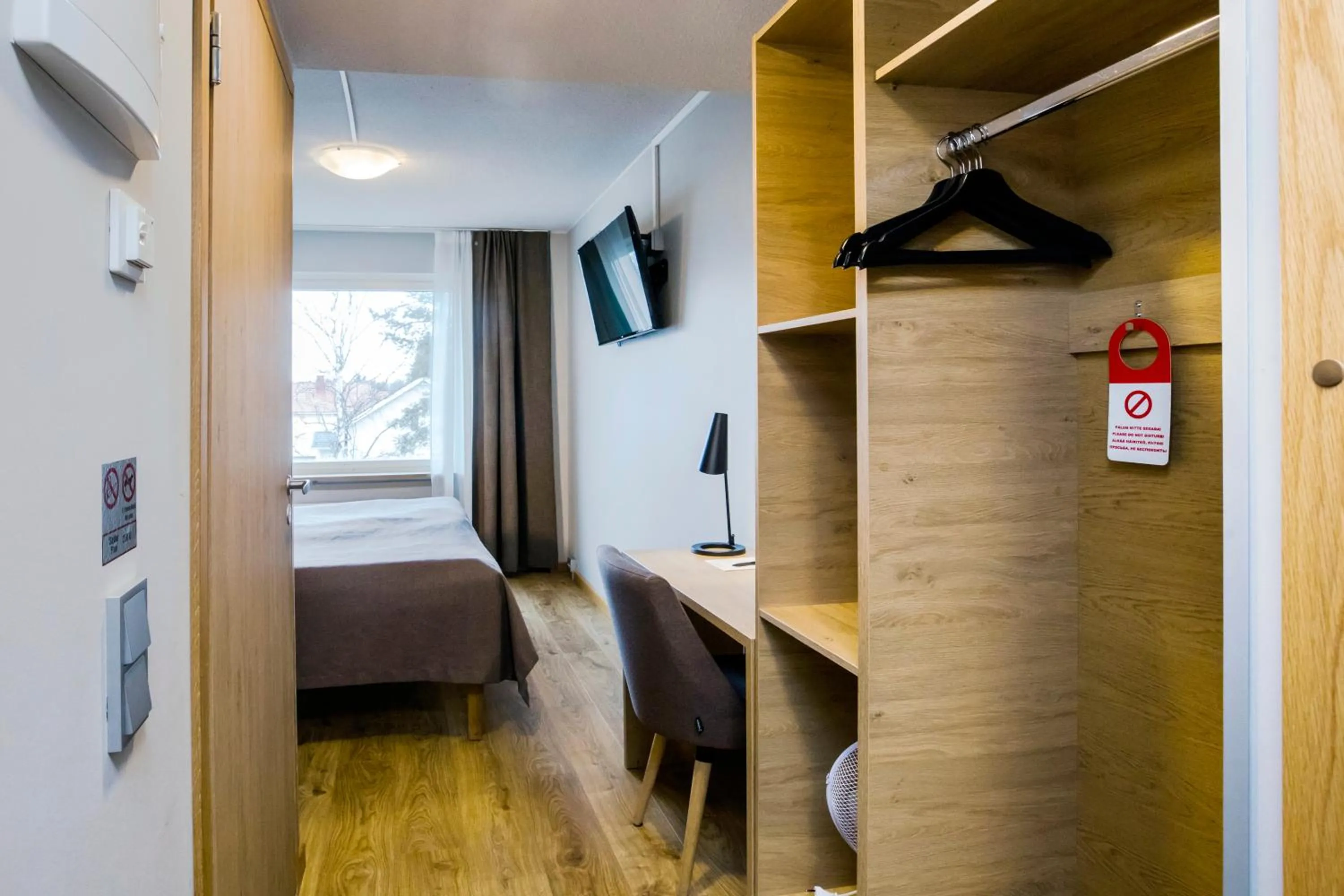 Photo of the whole room, Bed in Hotelli Toivola