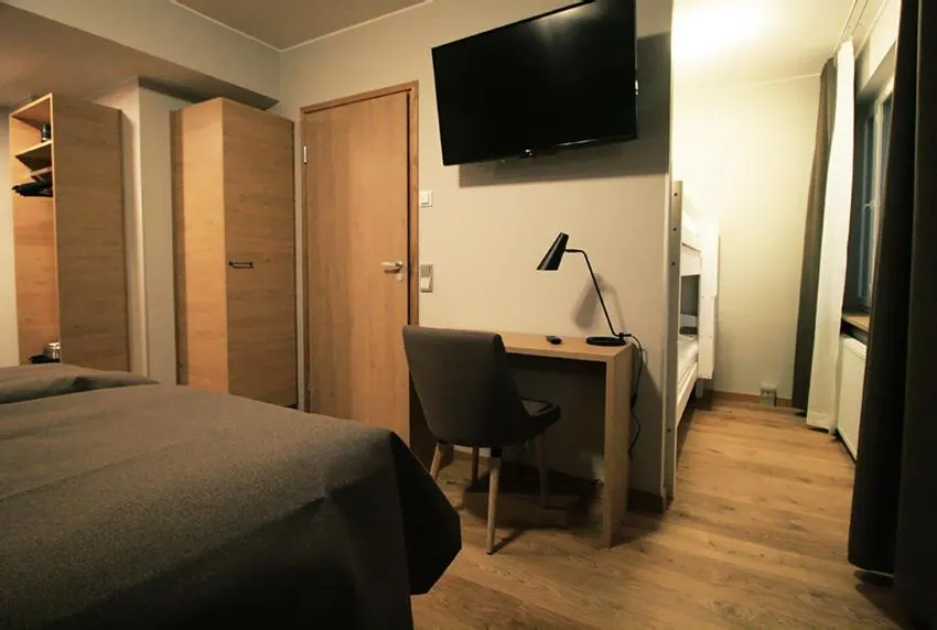 Photo of the whole room, Bed in Hotelli Toivola