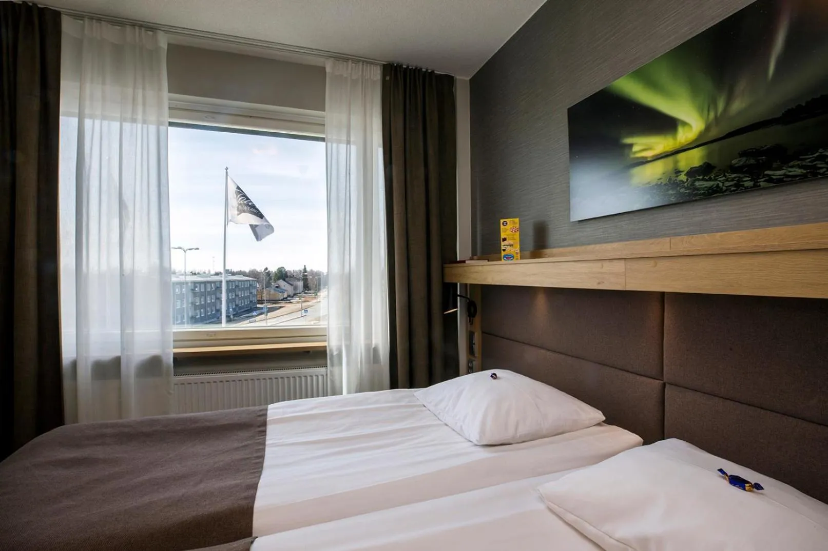 Photo of the whole room, Bed in Hotelli Toivola