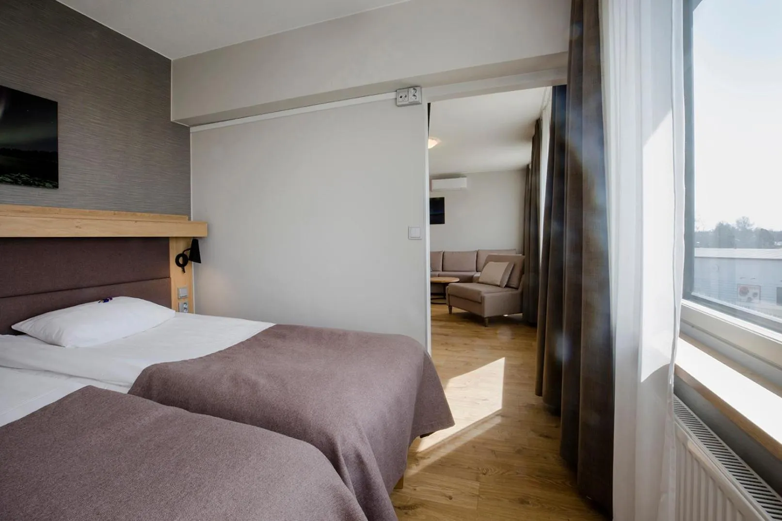 Photo of the whole room, Bed in Hotelli Toivola