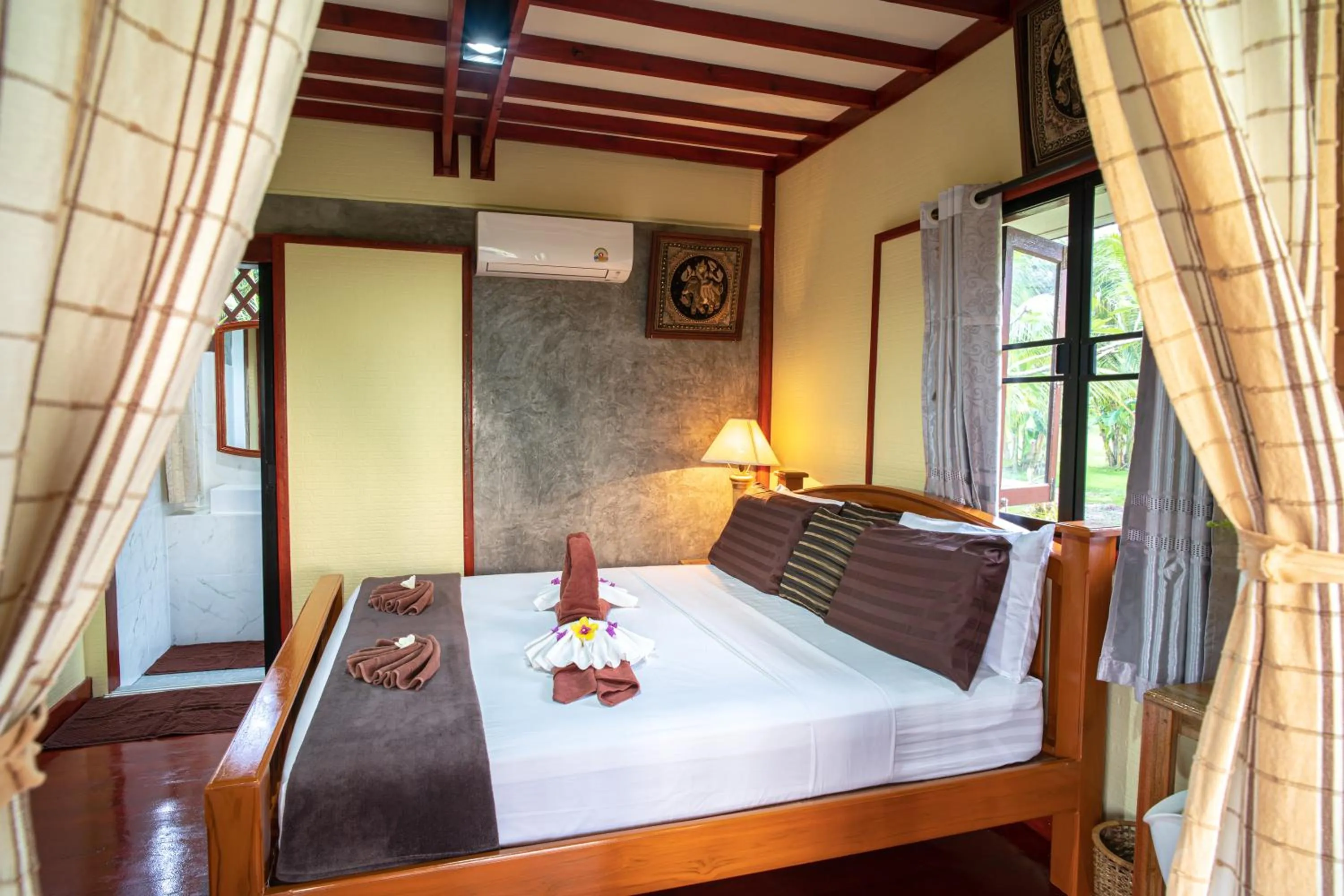 Bed in SiBoya Bungalows
