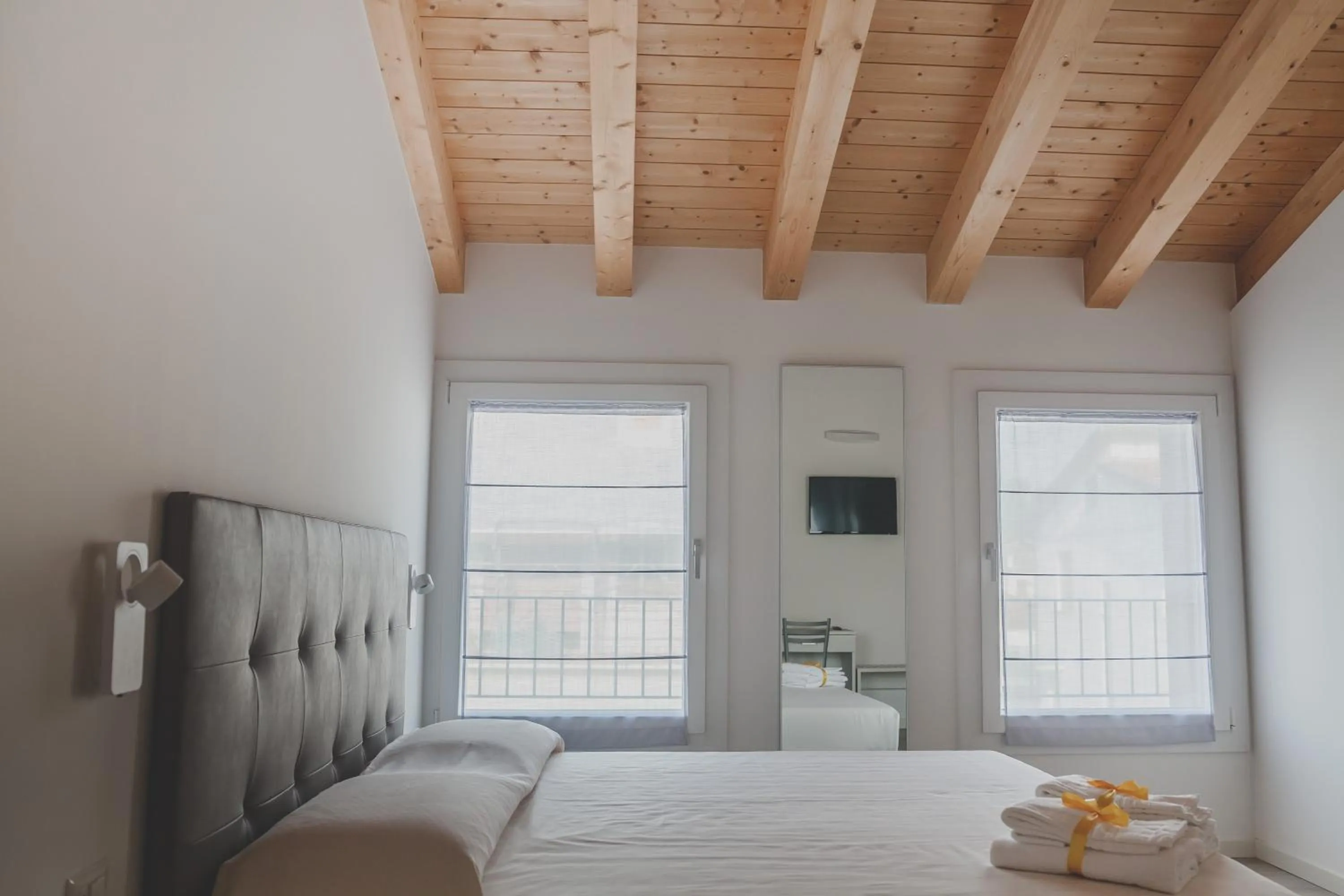 Bed in Terra Ferma Rooms&More