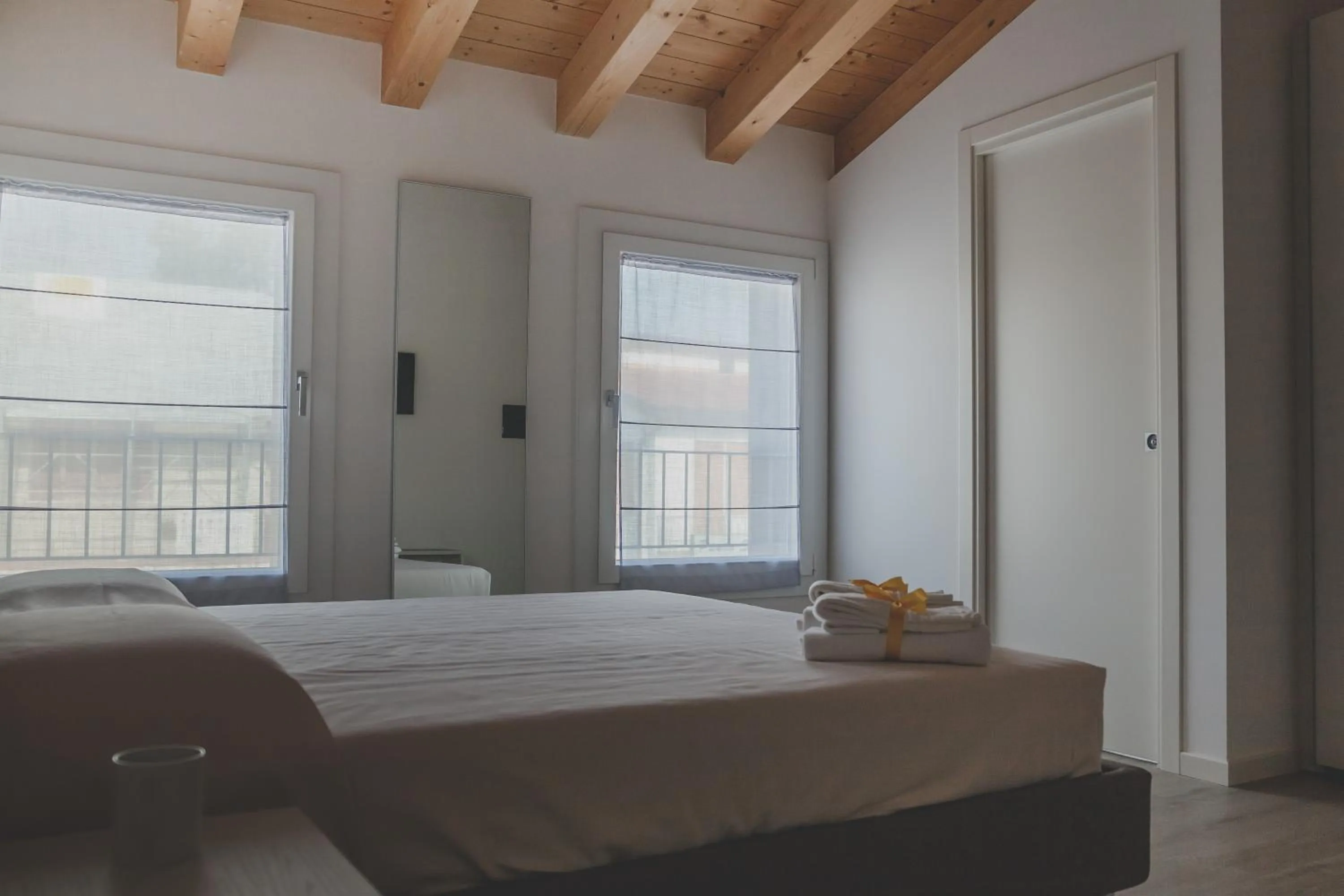 Bed in Terra Ferma Rooms&More