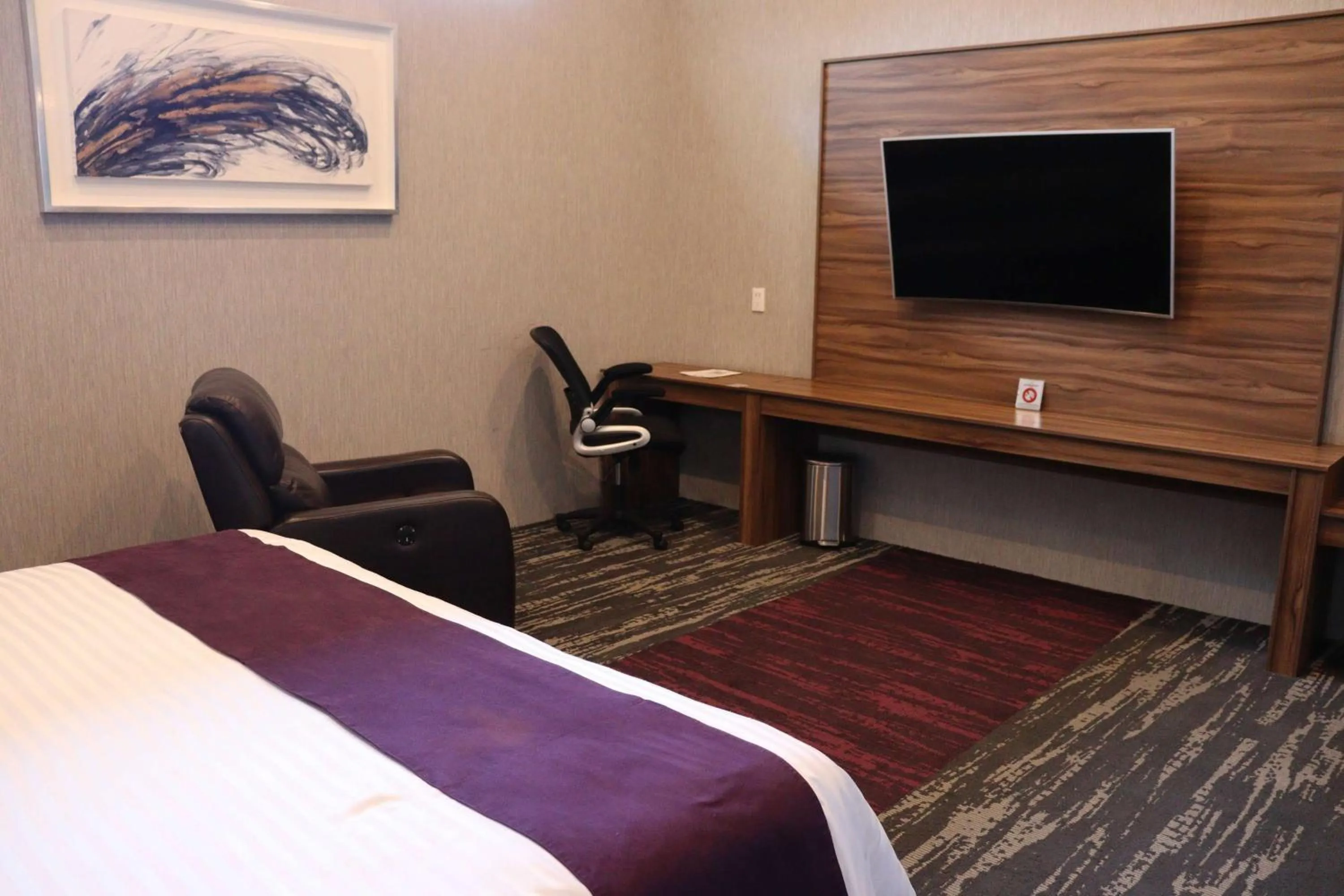 Bed in Wyndham Garden Aguascalientes Hotel & Casino