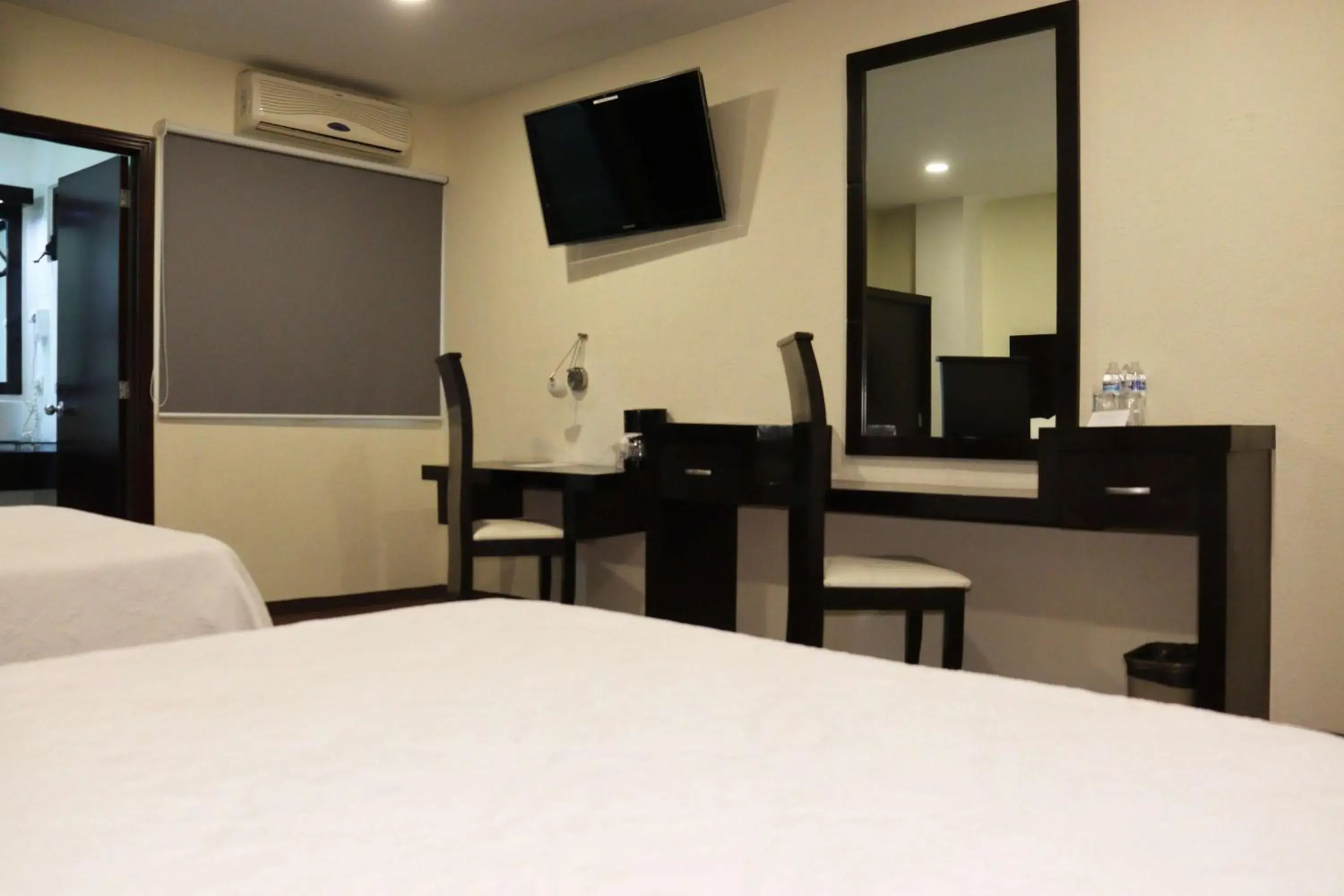 Photo of the whole room, Bed in Wyndham Garden Aguascalientes Hotel & Casino Photo of the whole room, Bed in Wyndham Garden Aguascalientes Hotel & Casino