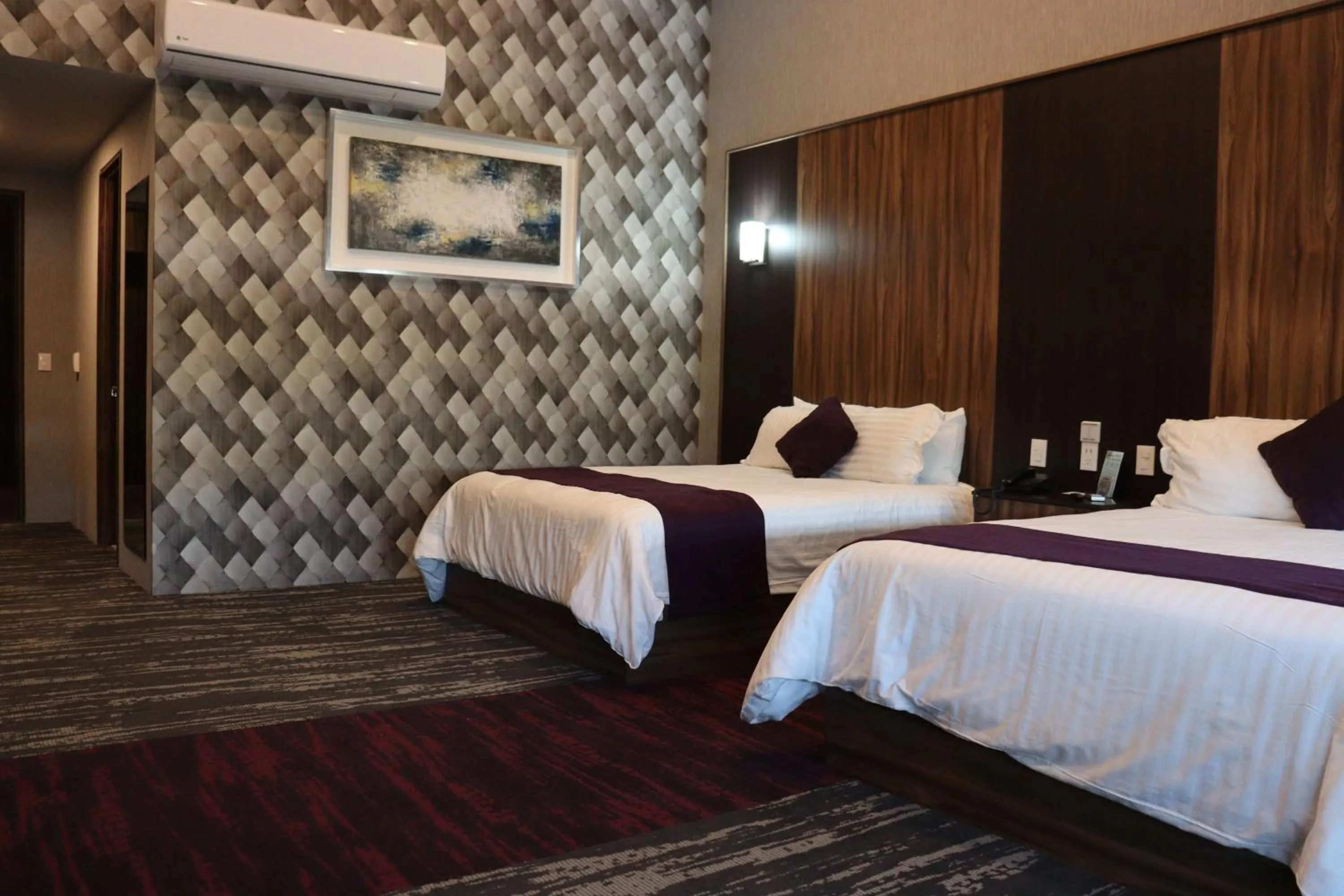 Photo of the whole room, Bed in Wyndham Garden Aguascalientes Hotel & Casino