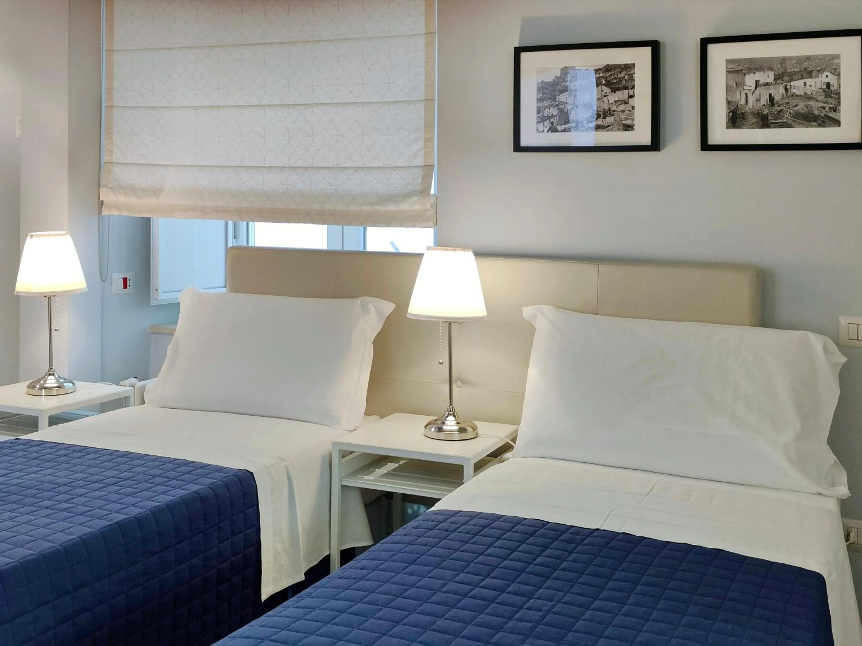 Bed in L'OSPITE - LIFESTYLE RESIDENCE, Design Rooms