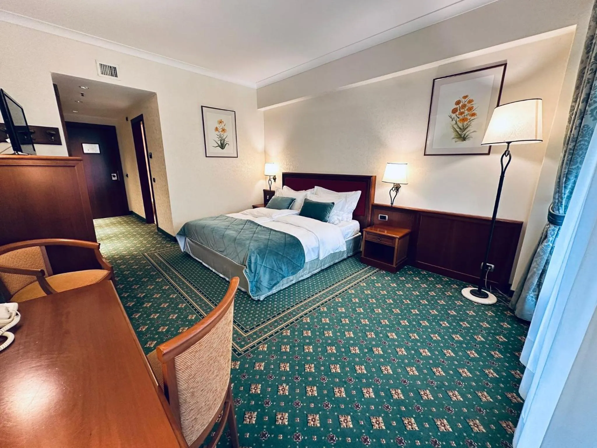 Bed in Lux Garden Hotel