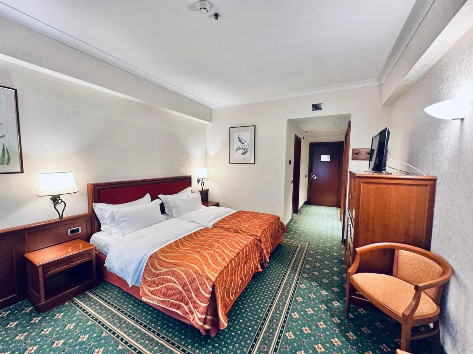 Bed in Lux Garden Hotel