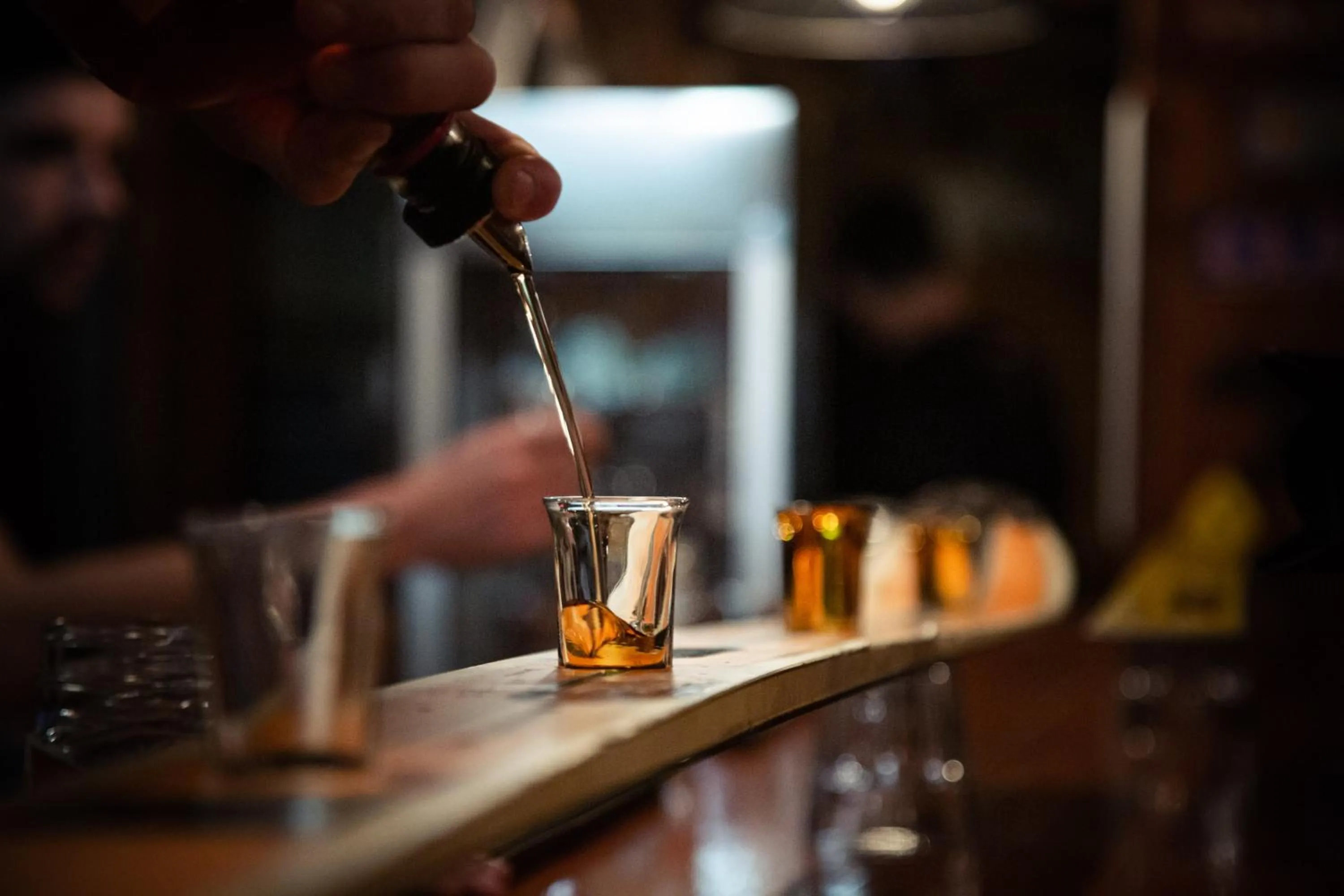 Lounge or bar in The Raging Elk Adventure Lodging