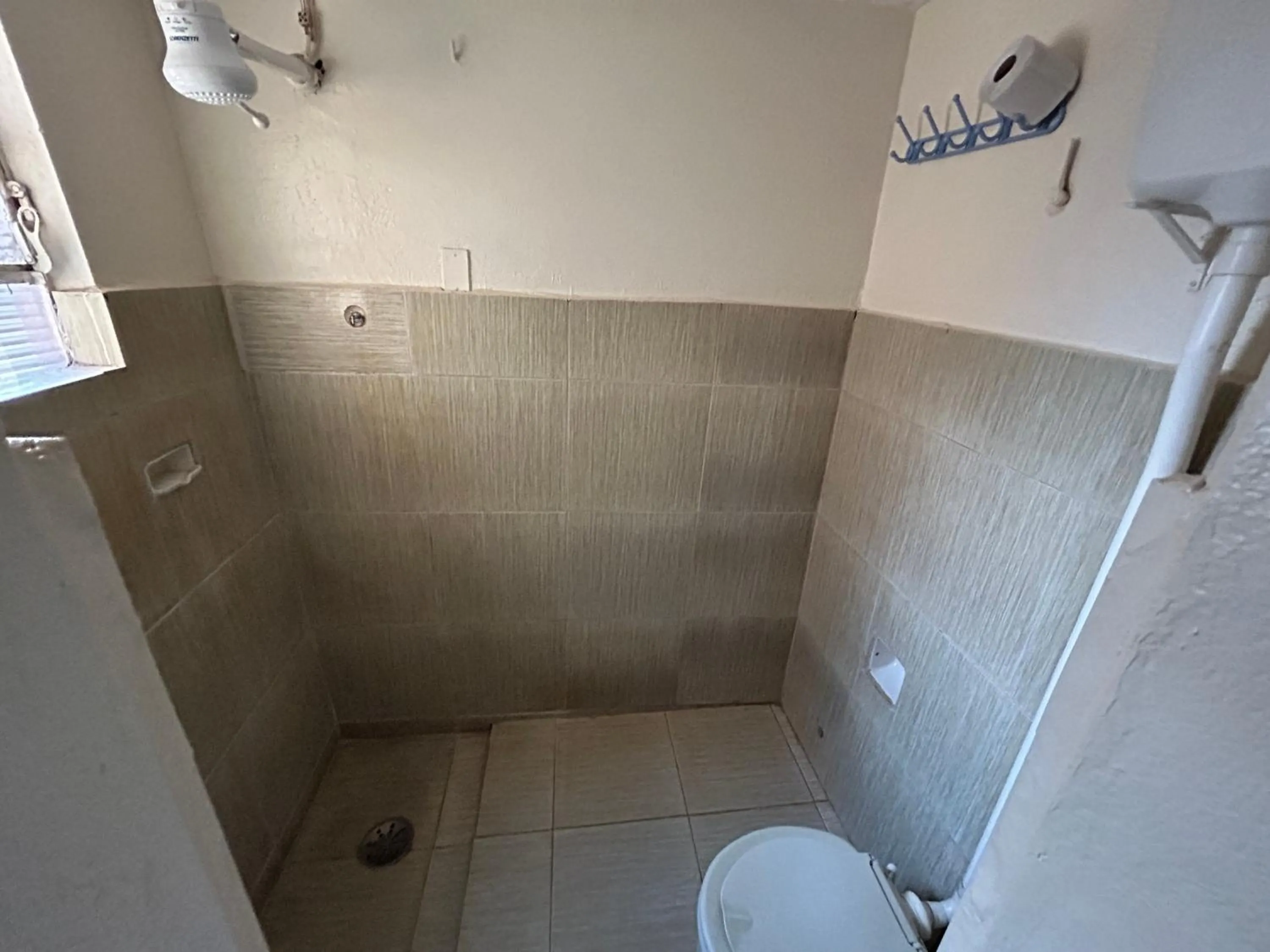 Quadruple Room with Private Bathroom - single occupancy in Hotel Santa Marta