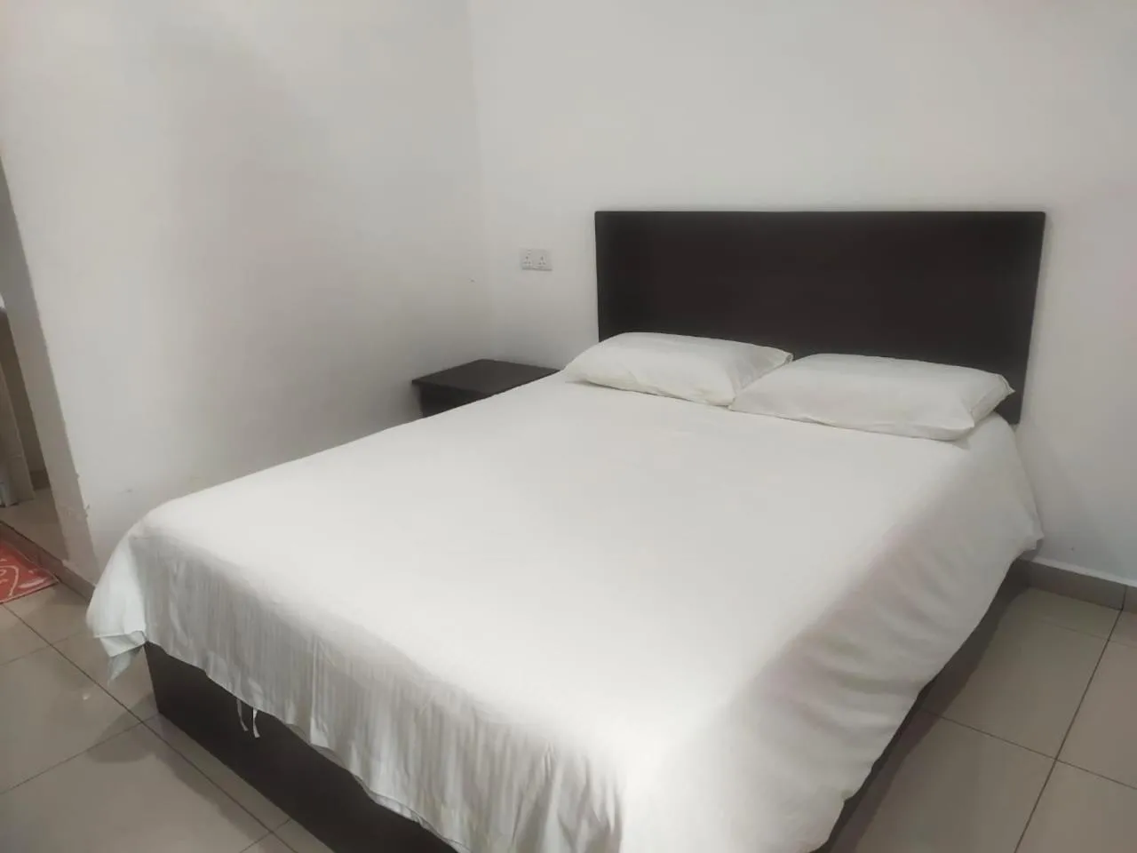 Bed in S&P Hotel