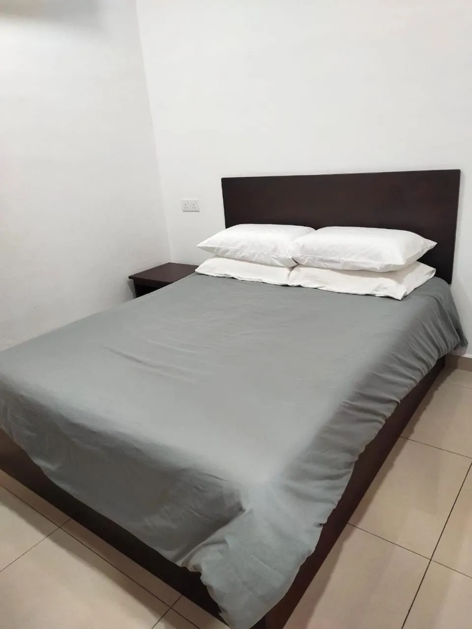 Bed in S&P Hotel