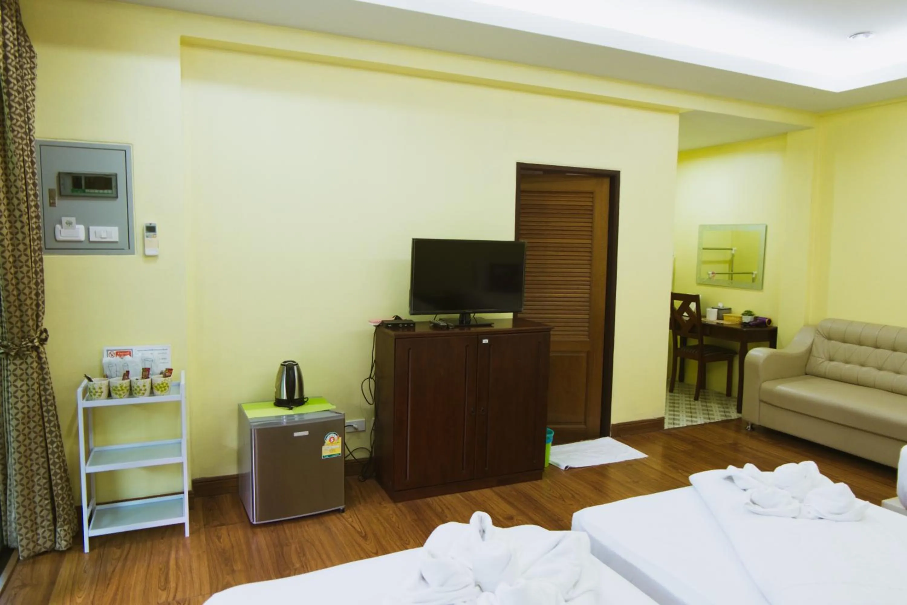 Communal lounge/ TV room, Bed in Akantuka Homestay