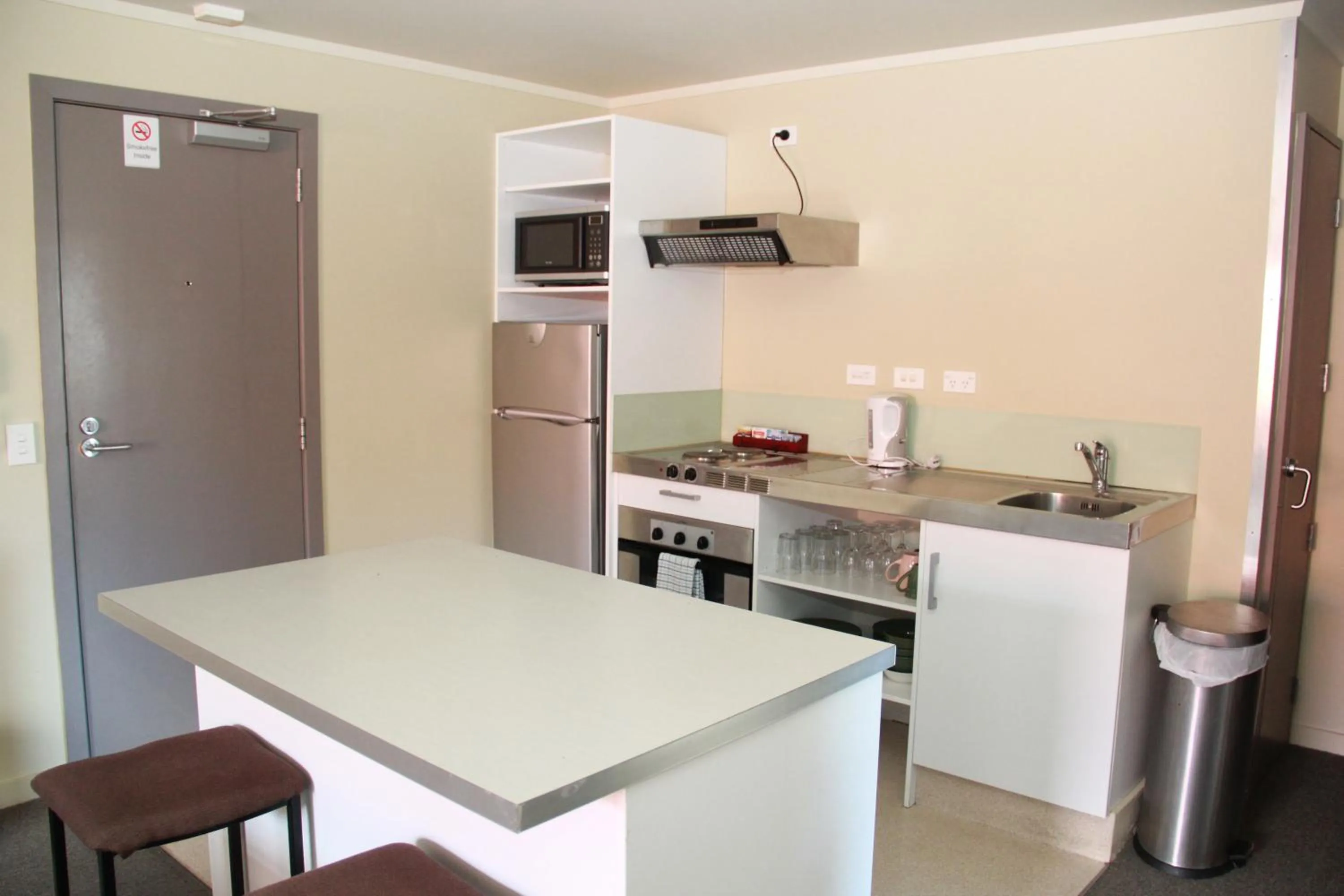 Kitchen or kitchenette in Nikau Apartments