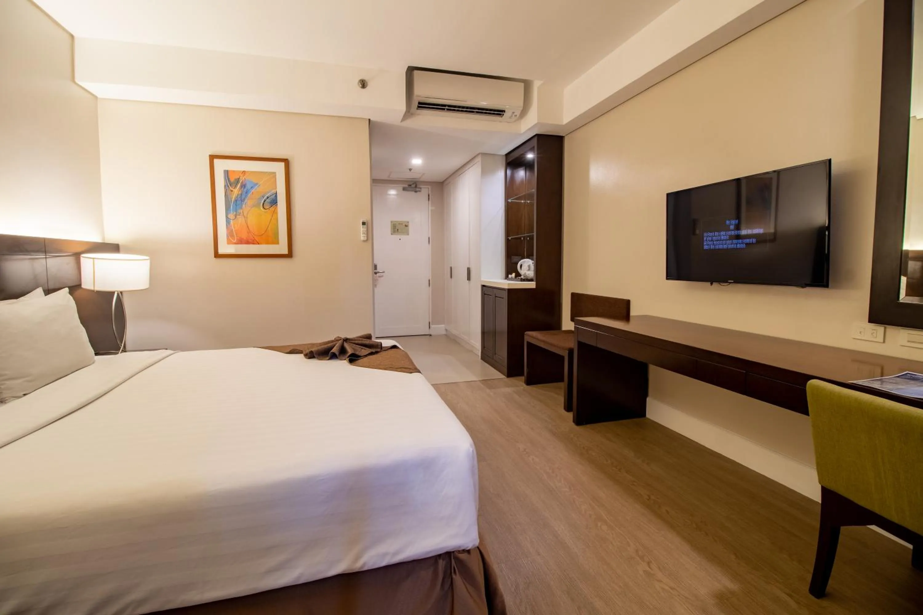 Bed in Harolds Hotel Cebu