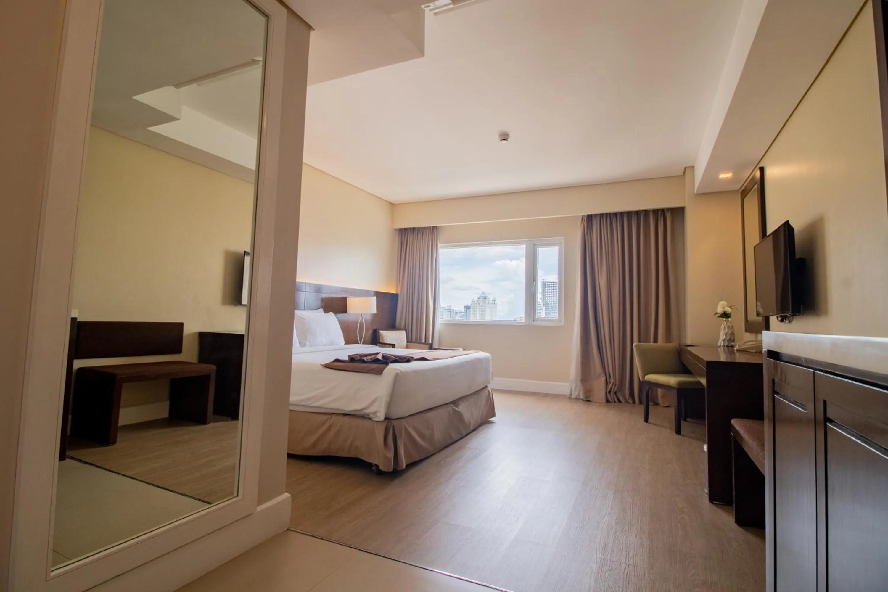 Bed in Harolds Hotel Cebu