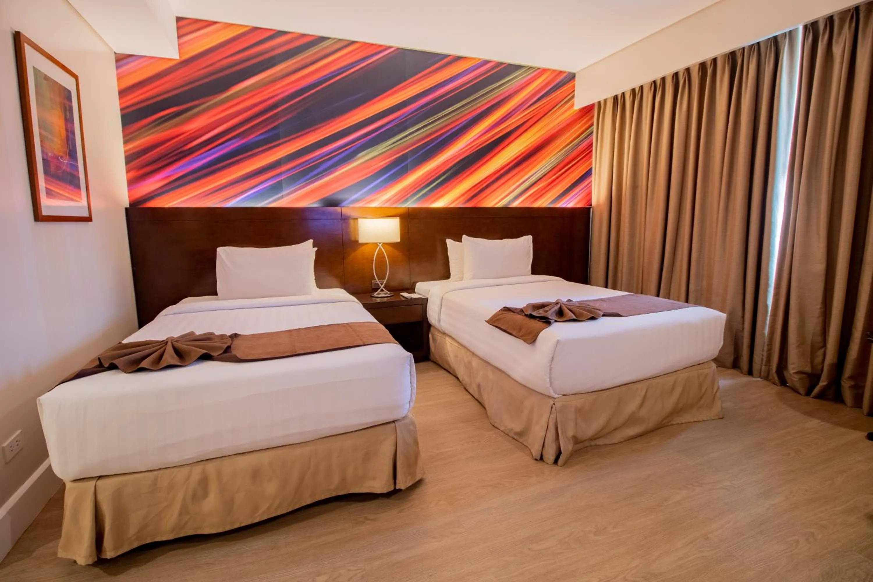 Bed in Harolds Hotel Cebu