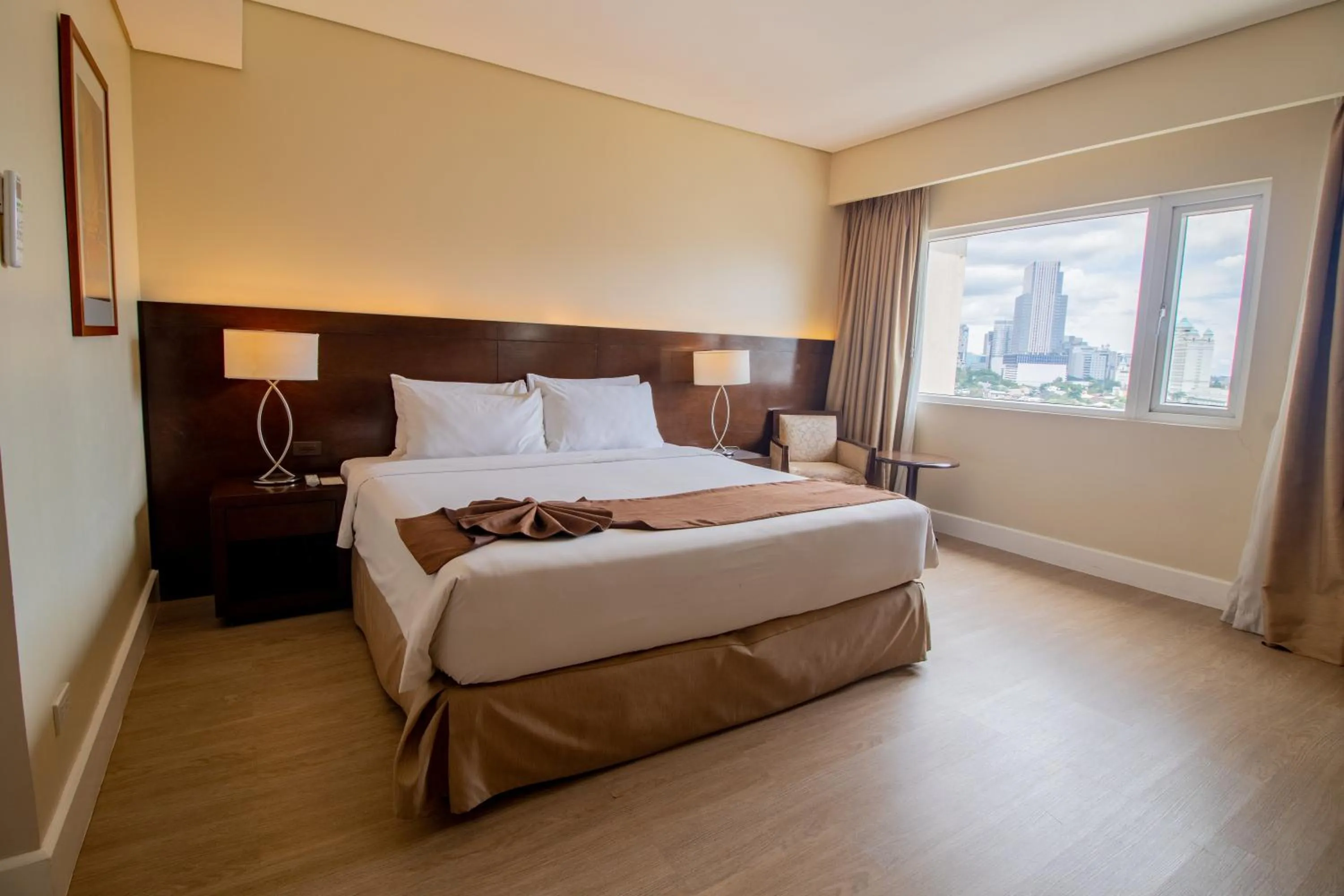 Bed in Harolds Hotel Cebu