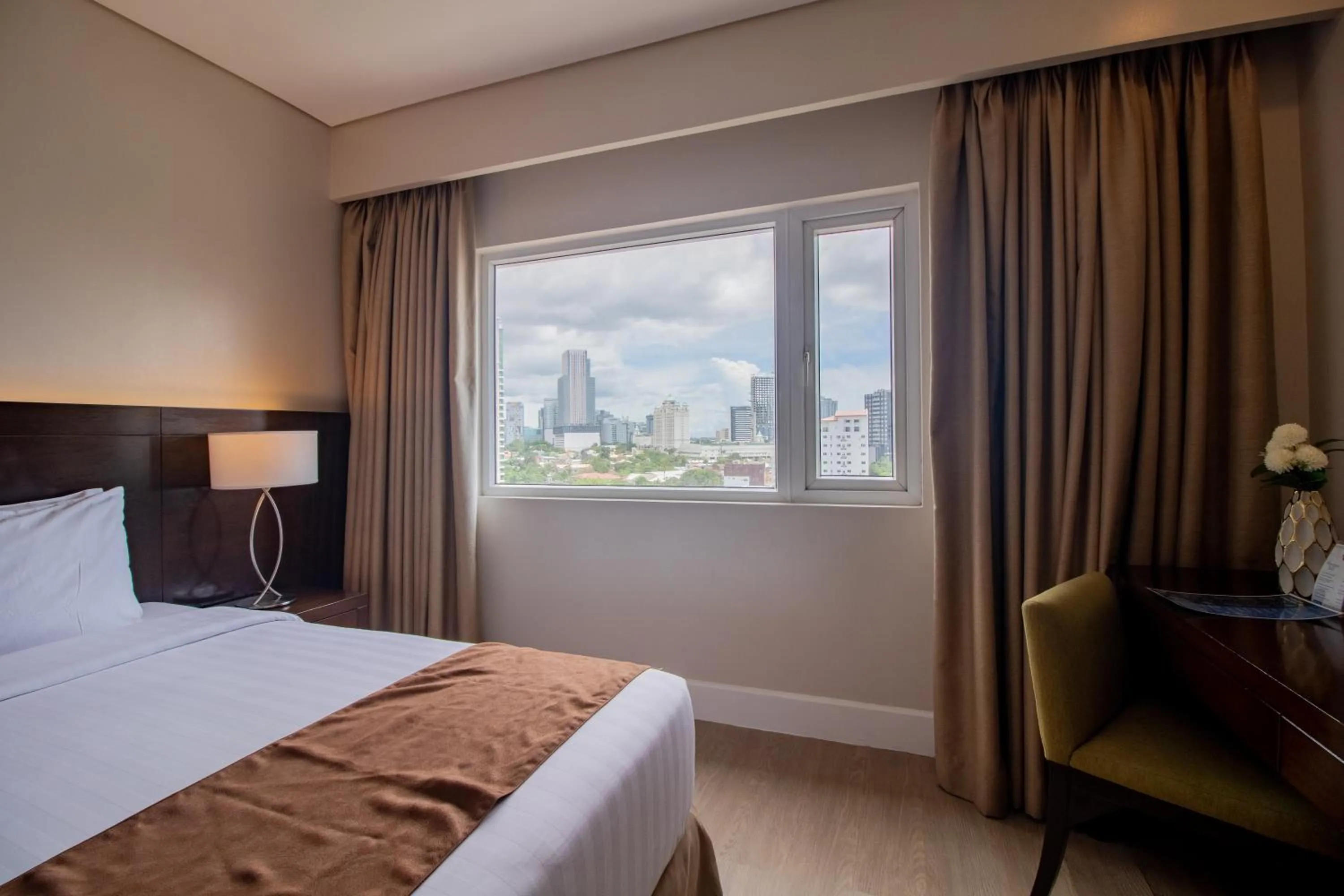 Bed in Harolds Hotel Cebu