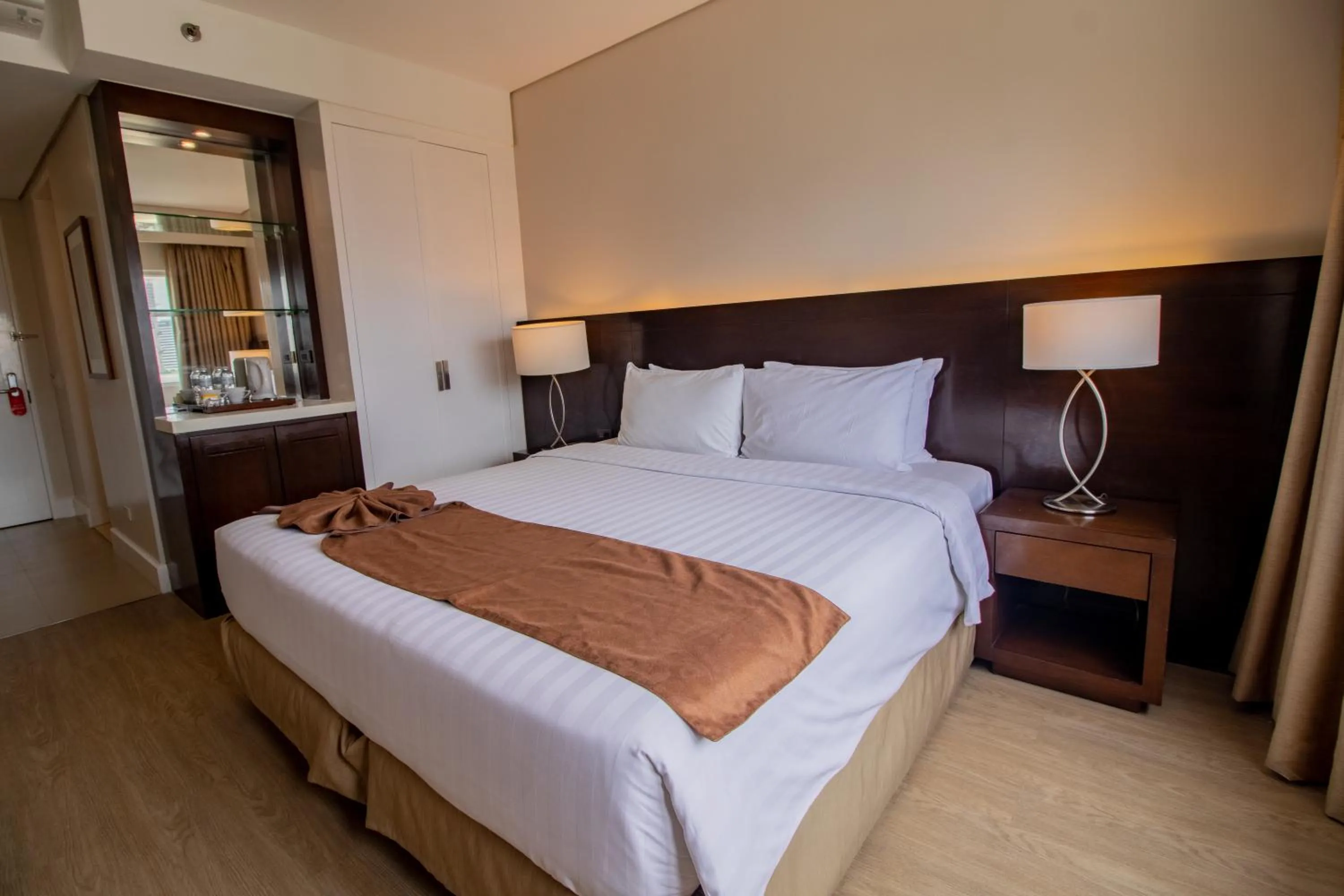 Bed in Harolds Hotel Cebu