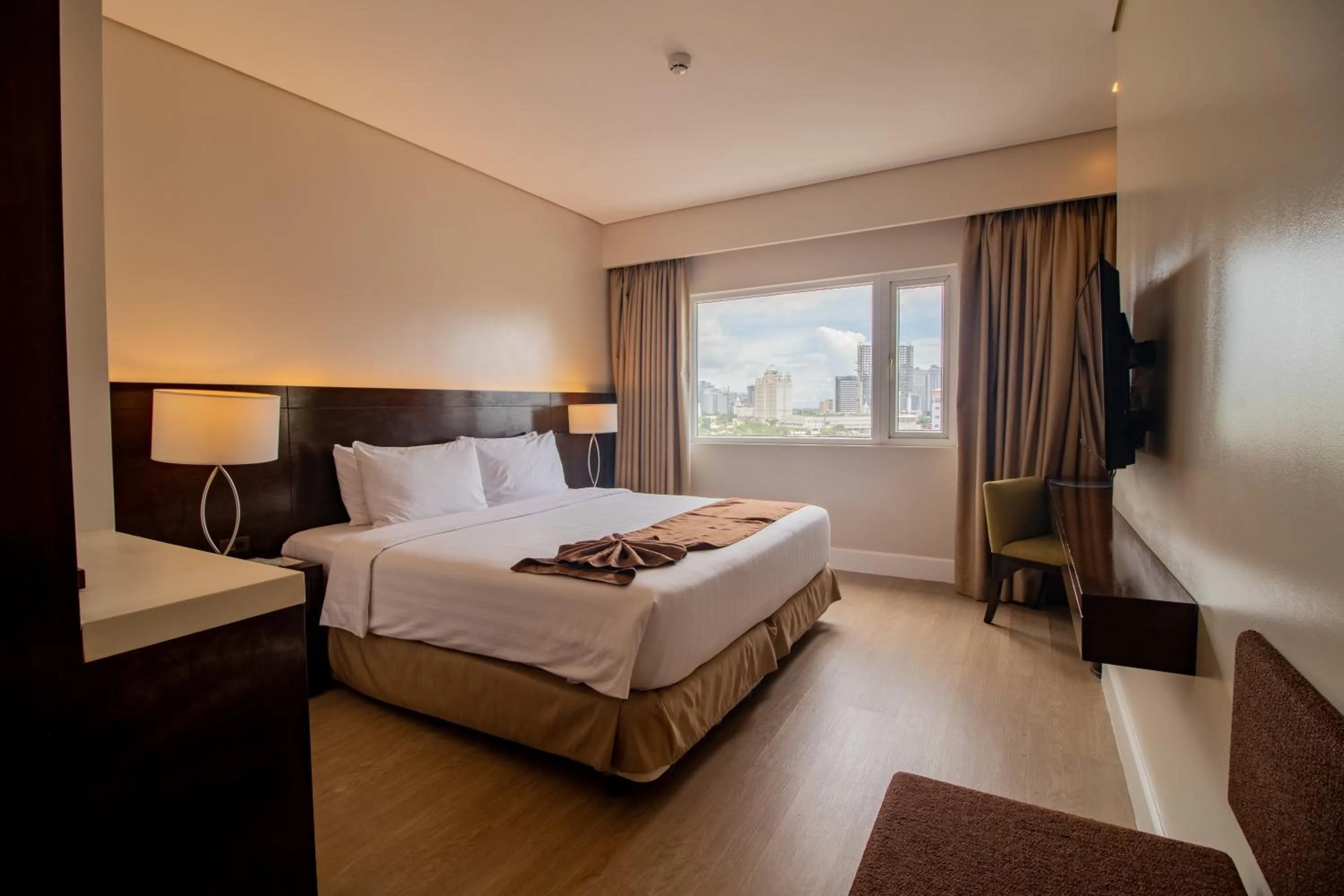 Bed in Harolds Hotel Cebu