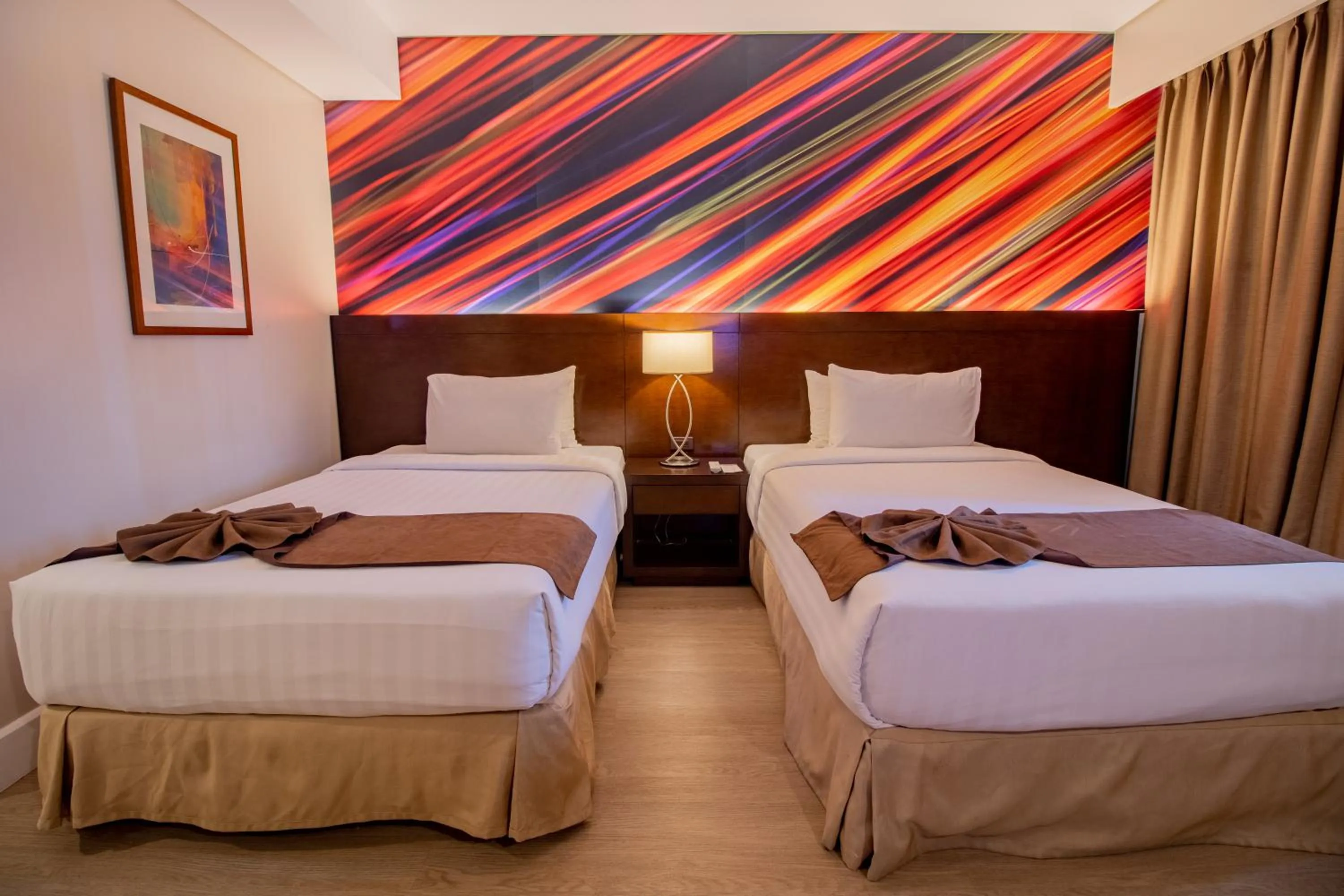 Bed in Harolds Hotel Cebu