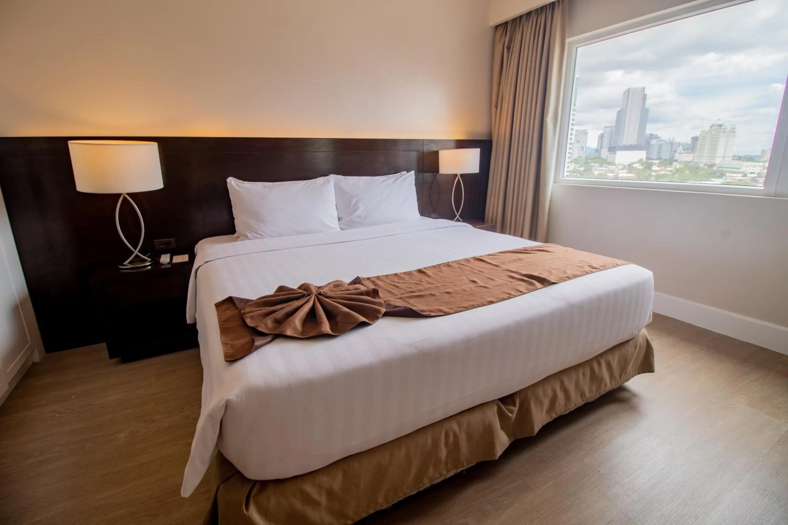 Bed in Harolds Hotel Cebu