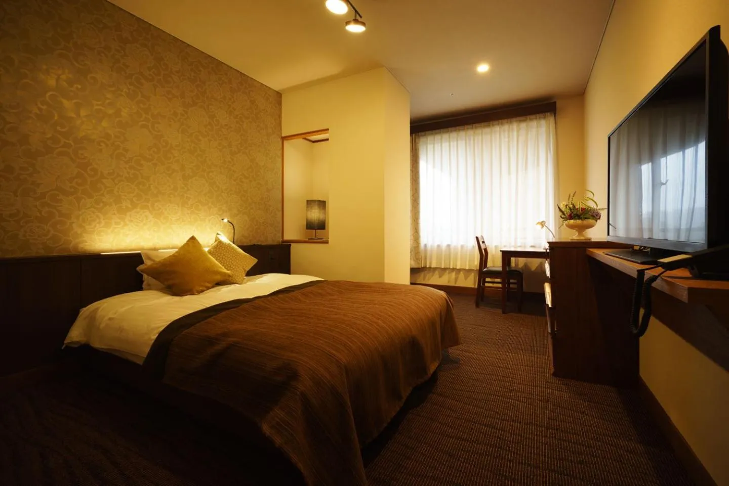 Bed in Kintarou Onsen Hotel