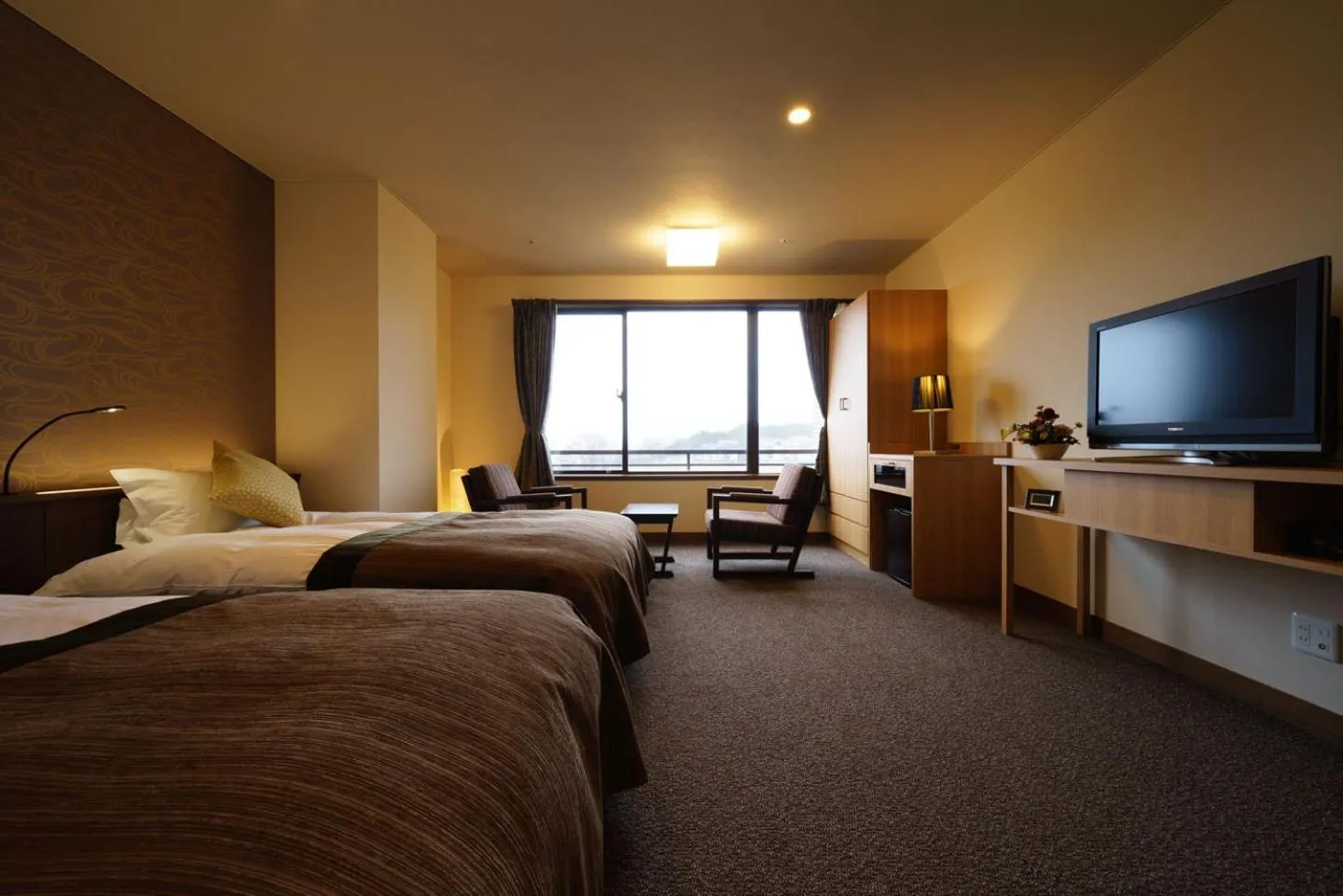 Bed in Kintarou Onsen Hotel