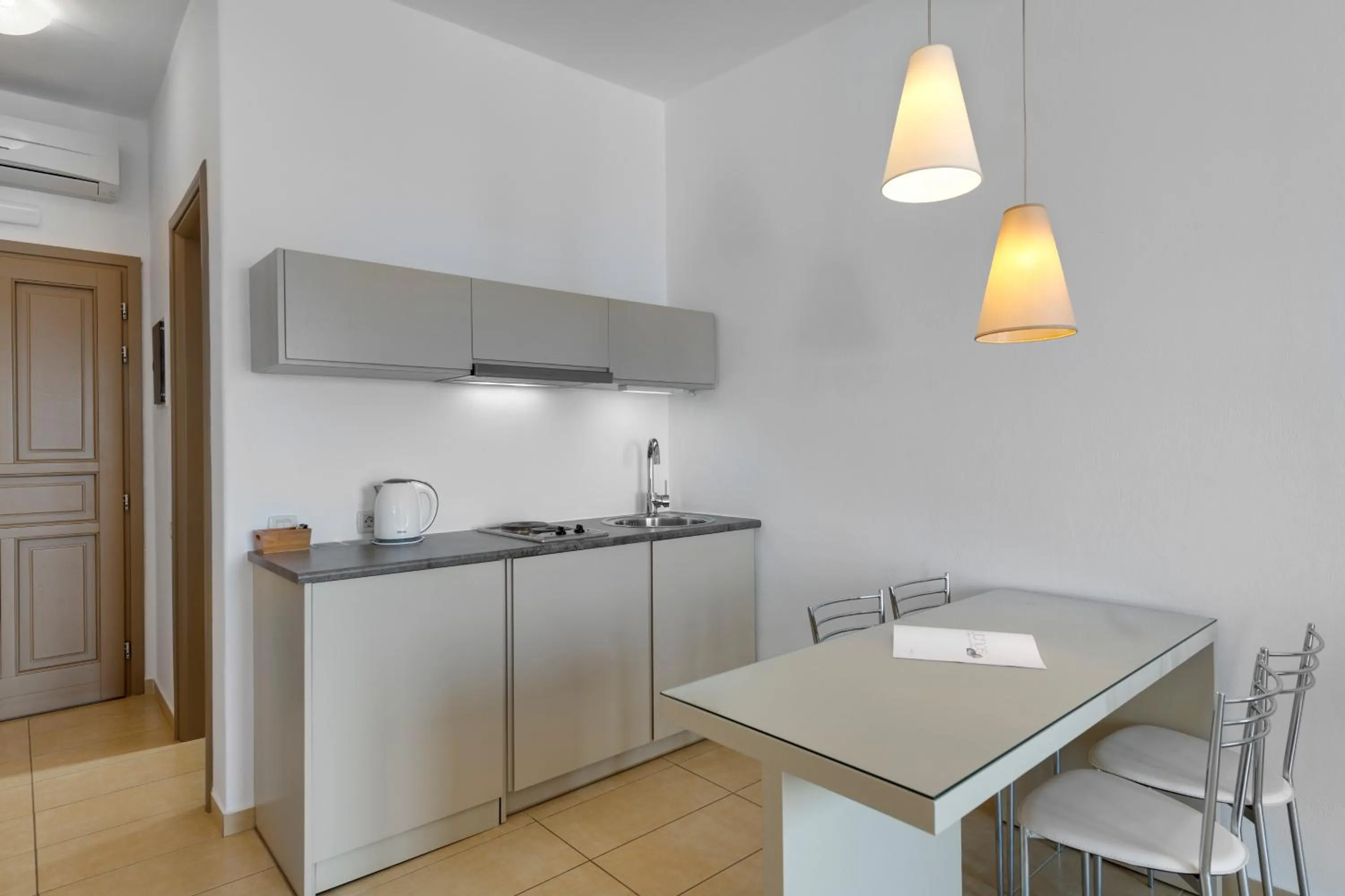 Coffee/tea facilities in Lithos by Spyros & Flora