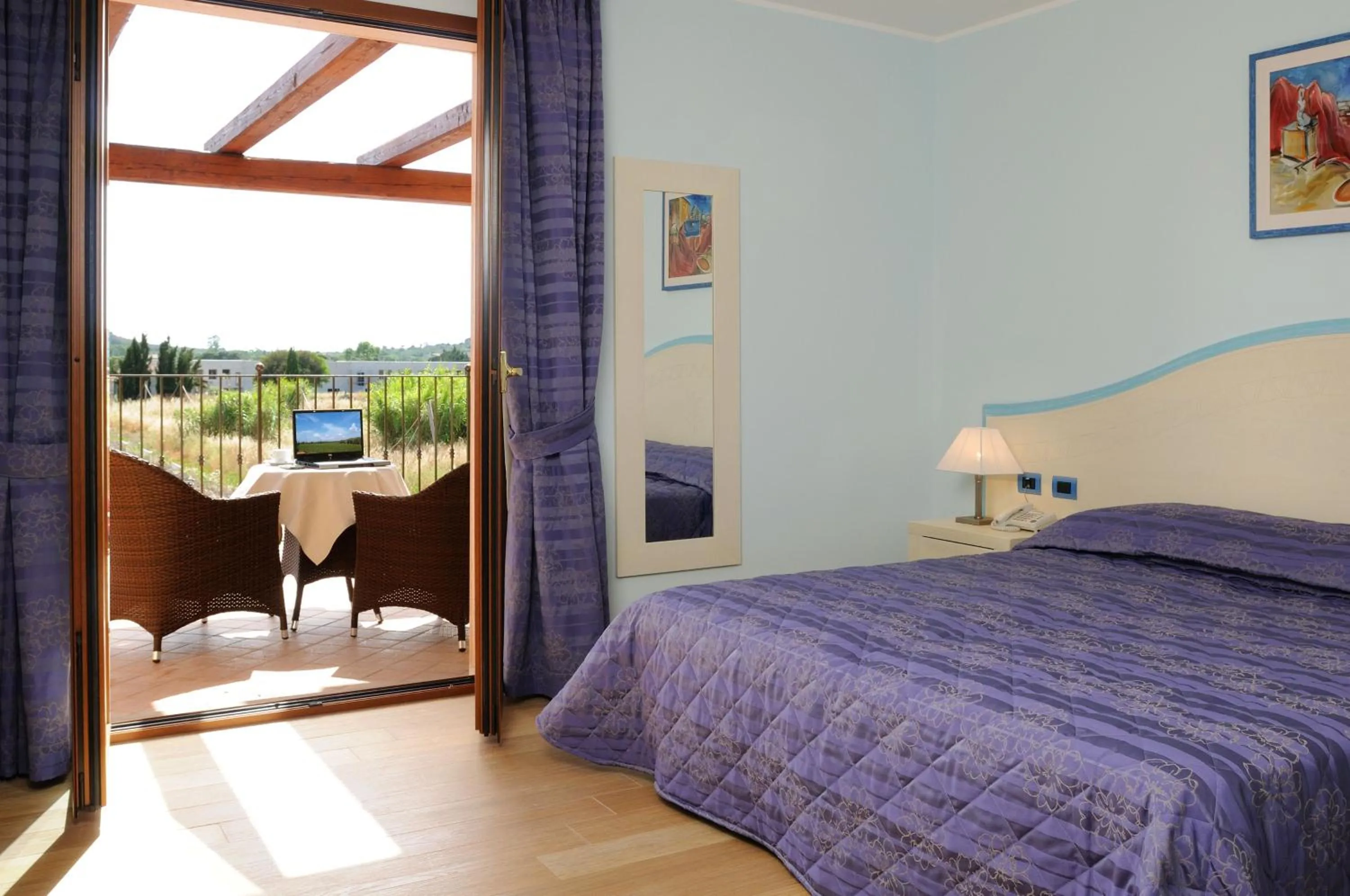 Bed in Hotel Sa Cheya Relais & Spa