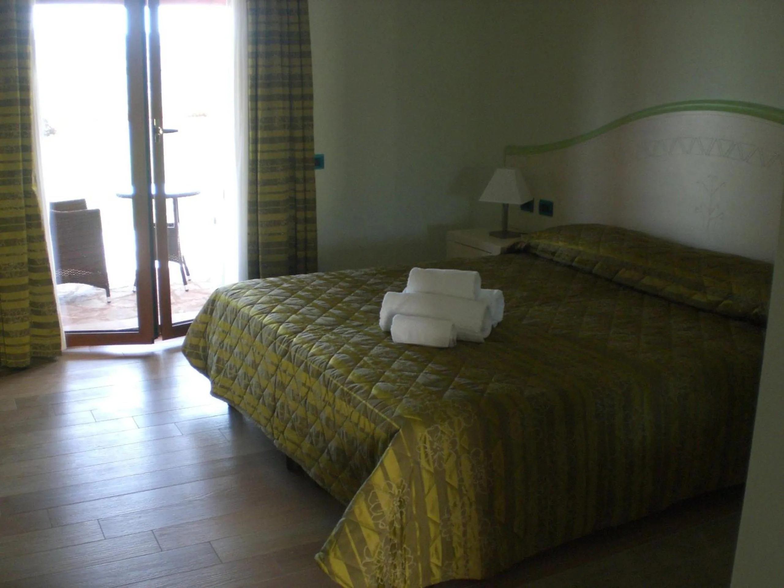 Bed in Hotel Sa Cheya Relais & Spa