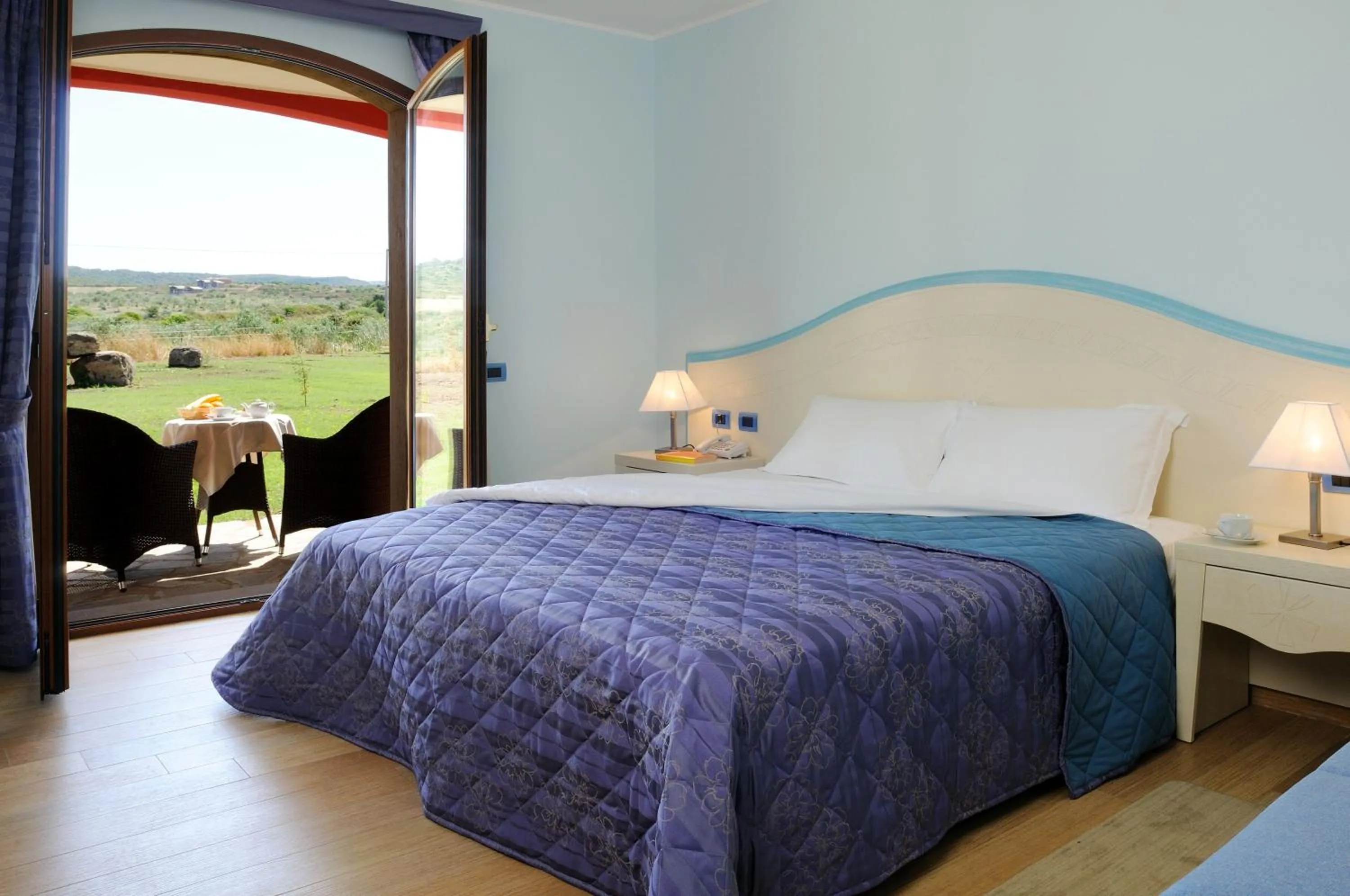 Bed in Hotel Sa Cheya Relais & Spa