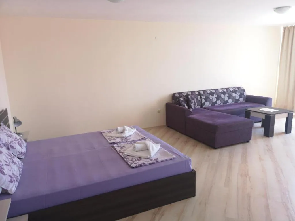 Bed in Rose Garden Omax Apartments