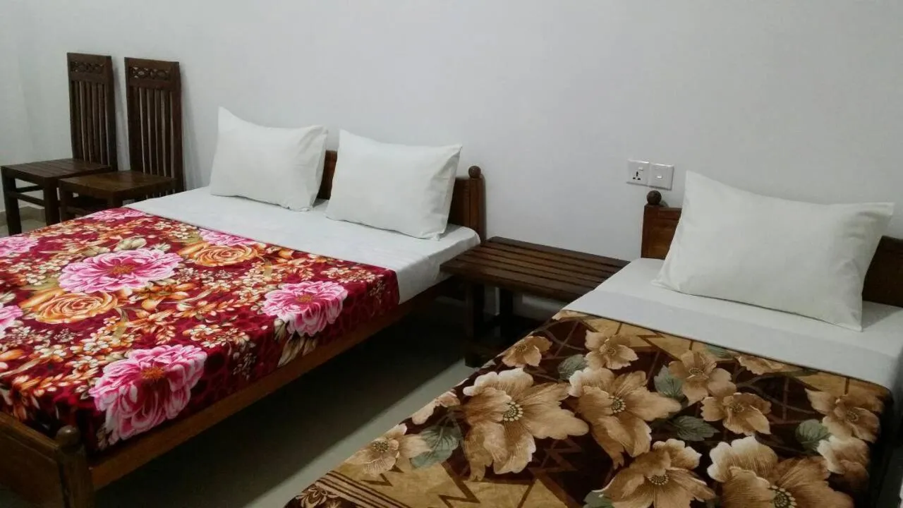 Bed in Tea Breeze Motel