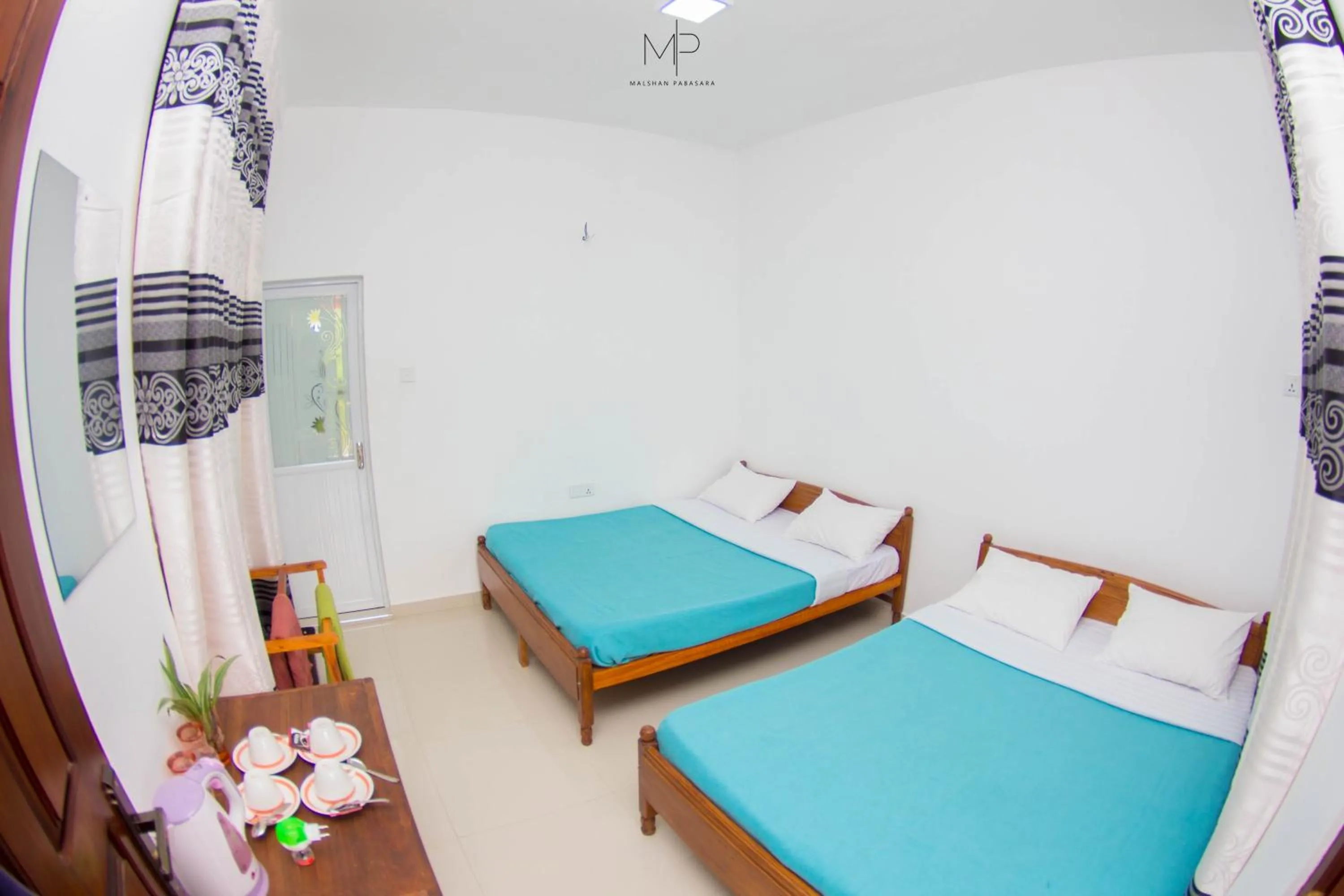 Bed in Tea Breeze Motel