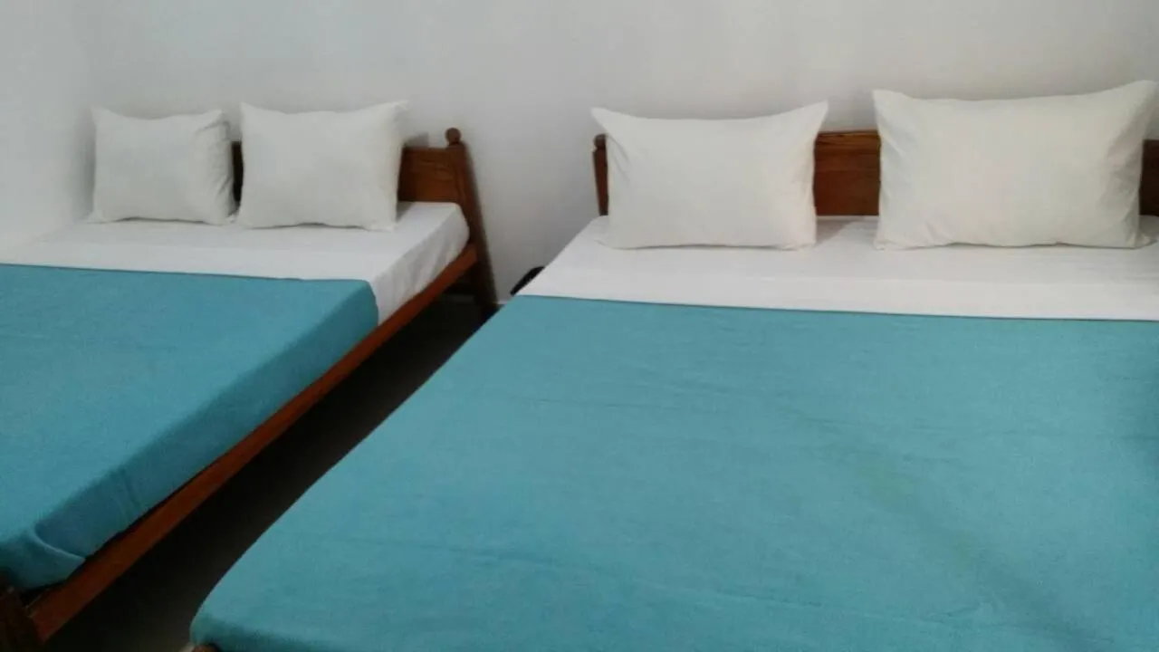 Bed in Tea Breeze Motel