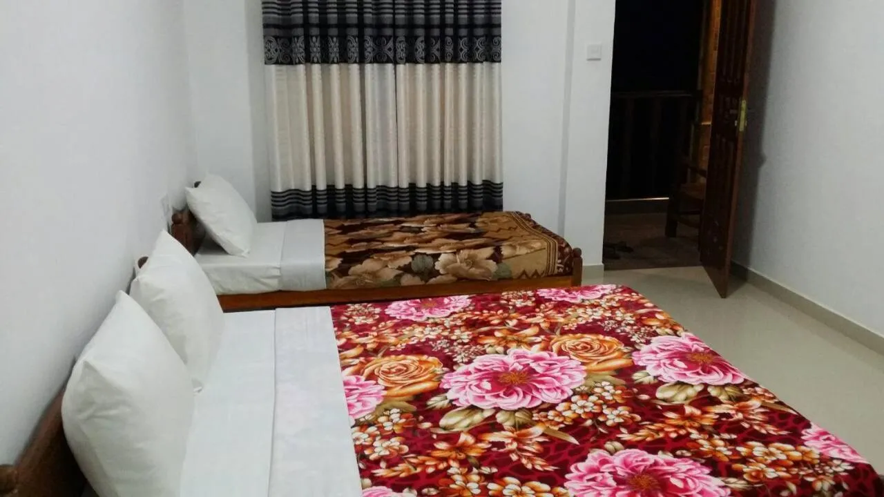 Bed in Tea Breeze Motel