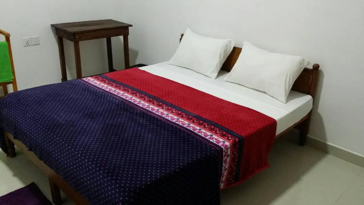 Bed in Tea Breeze Motel