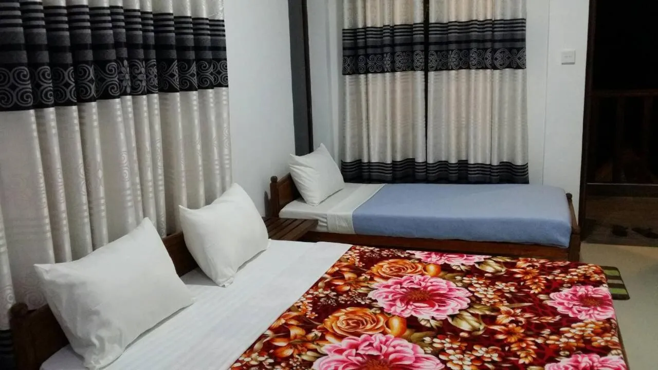 Bed in Tea Breeze Motel