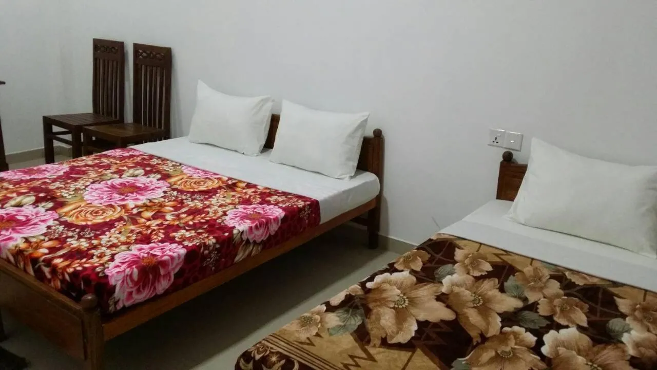 Bed in Tea Breeze Motel