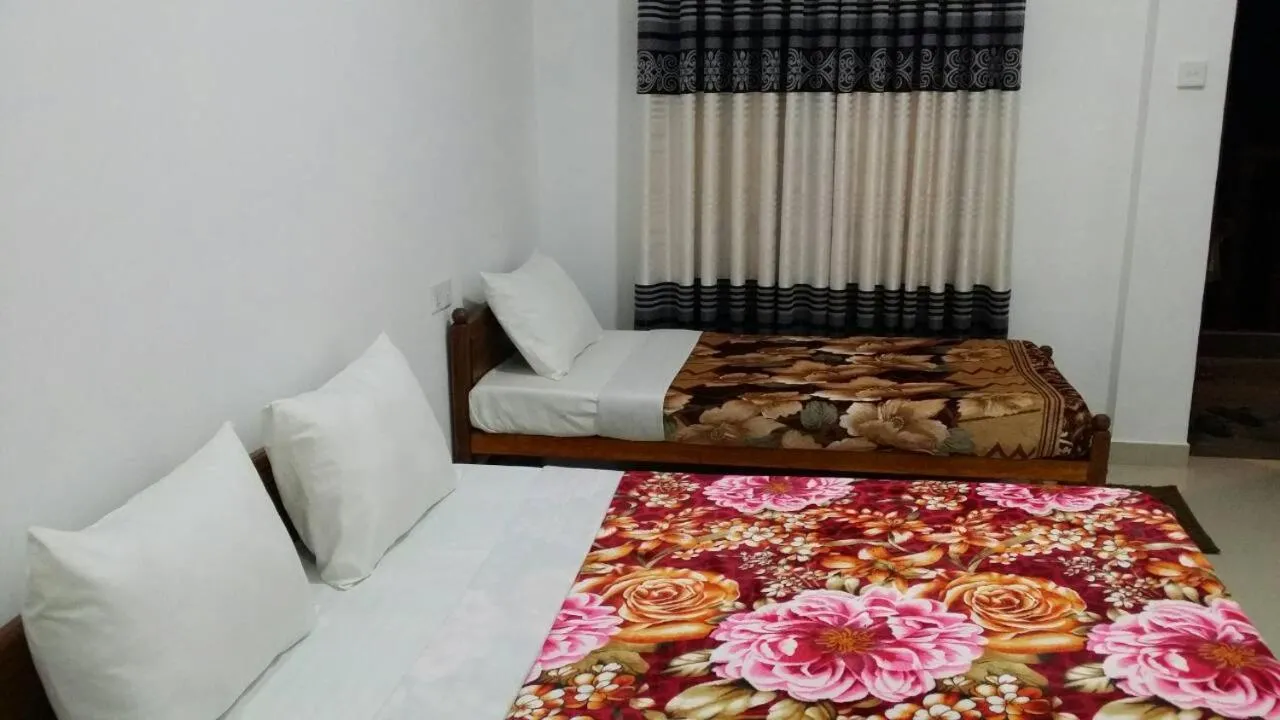 Bed in Tea Breeze Motel