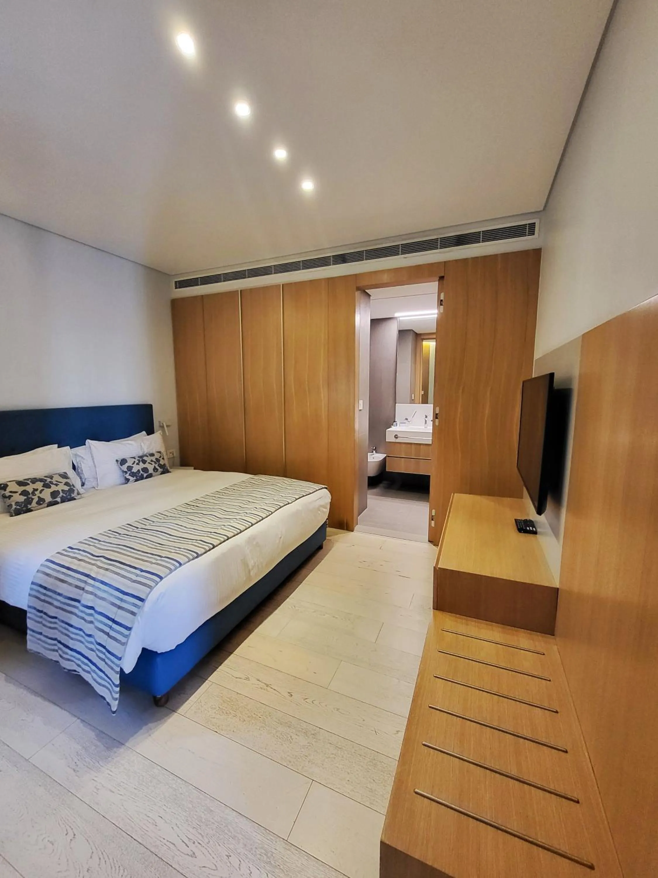 Bed in Monot Suites
