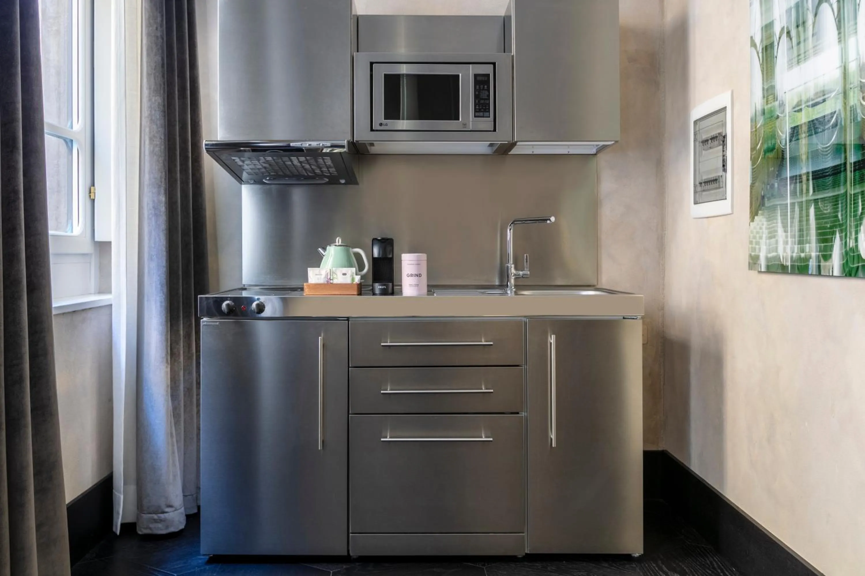 Kitchen or kitchenette in Numa Florence Palazzo Moro