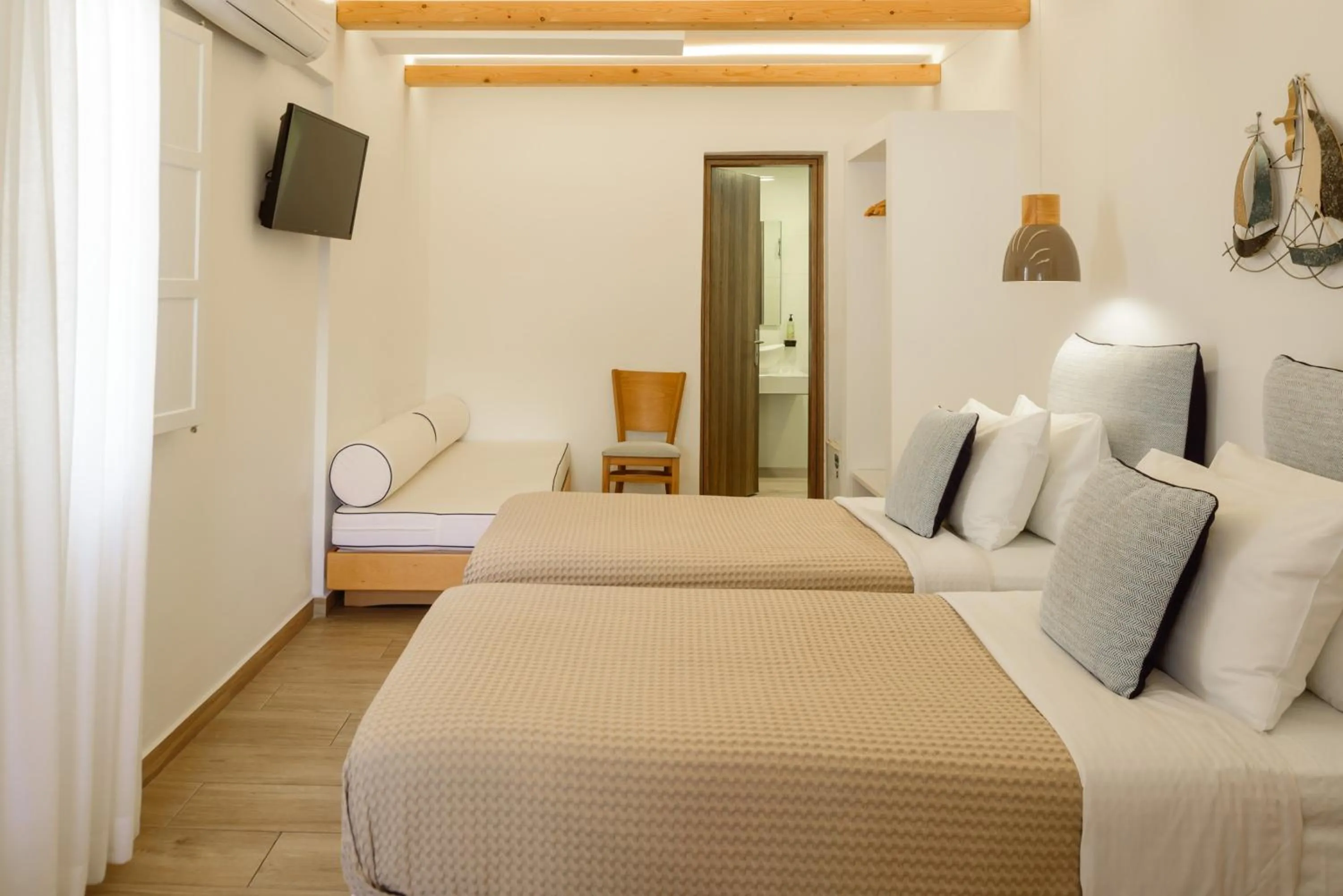 Bed in Karidis Hotel