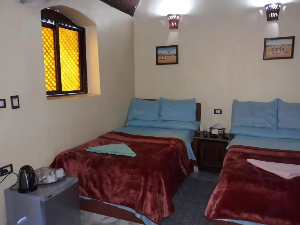 Bed in Maghrabi's Guest house