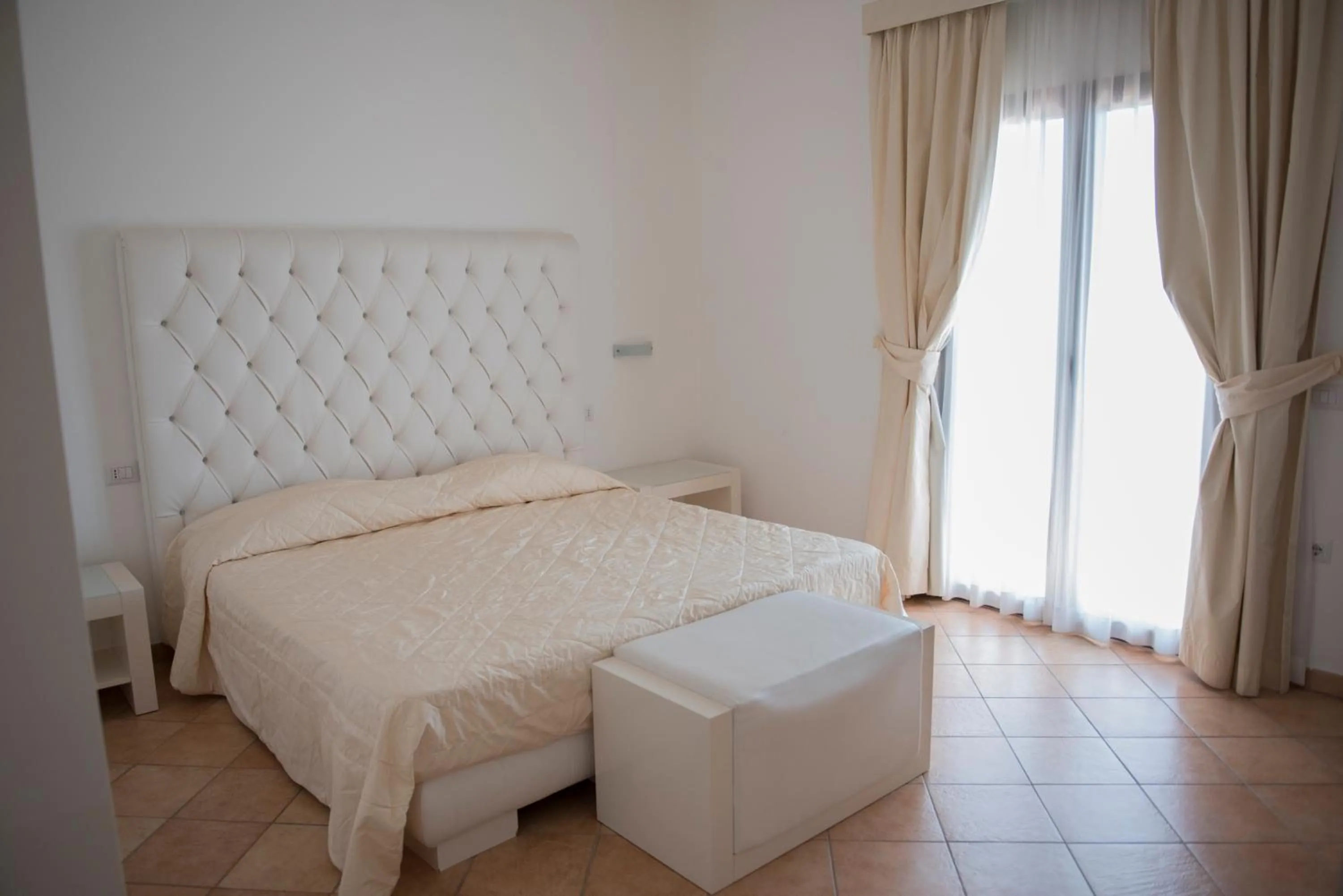 Bed in Hotel Caluna Charme