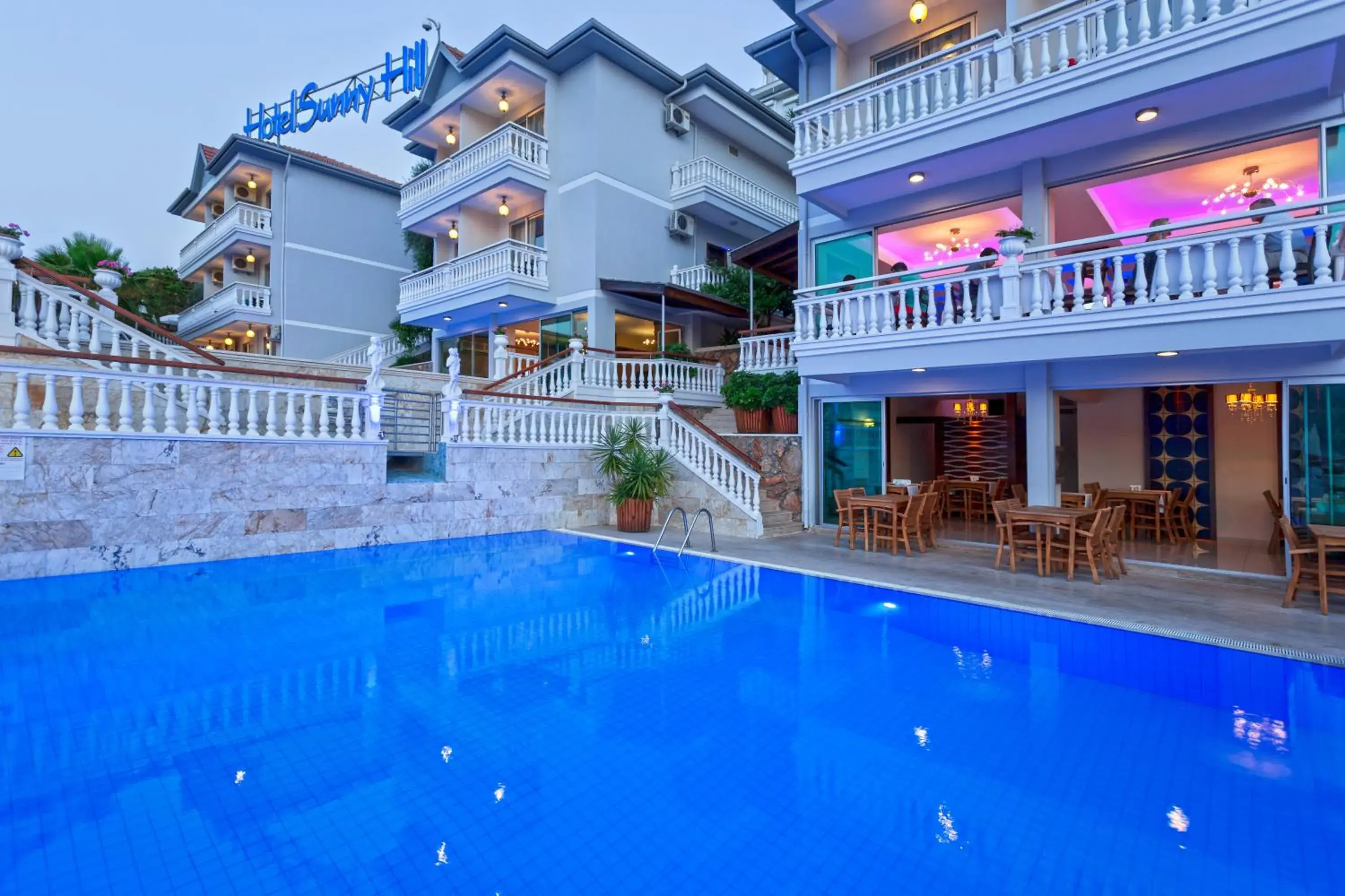 Swimming pool, Property Building in Sunny Hill Alya Hotel