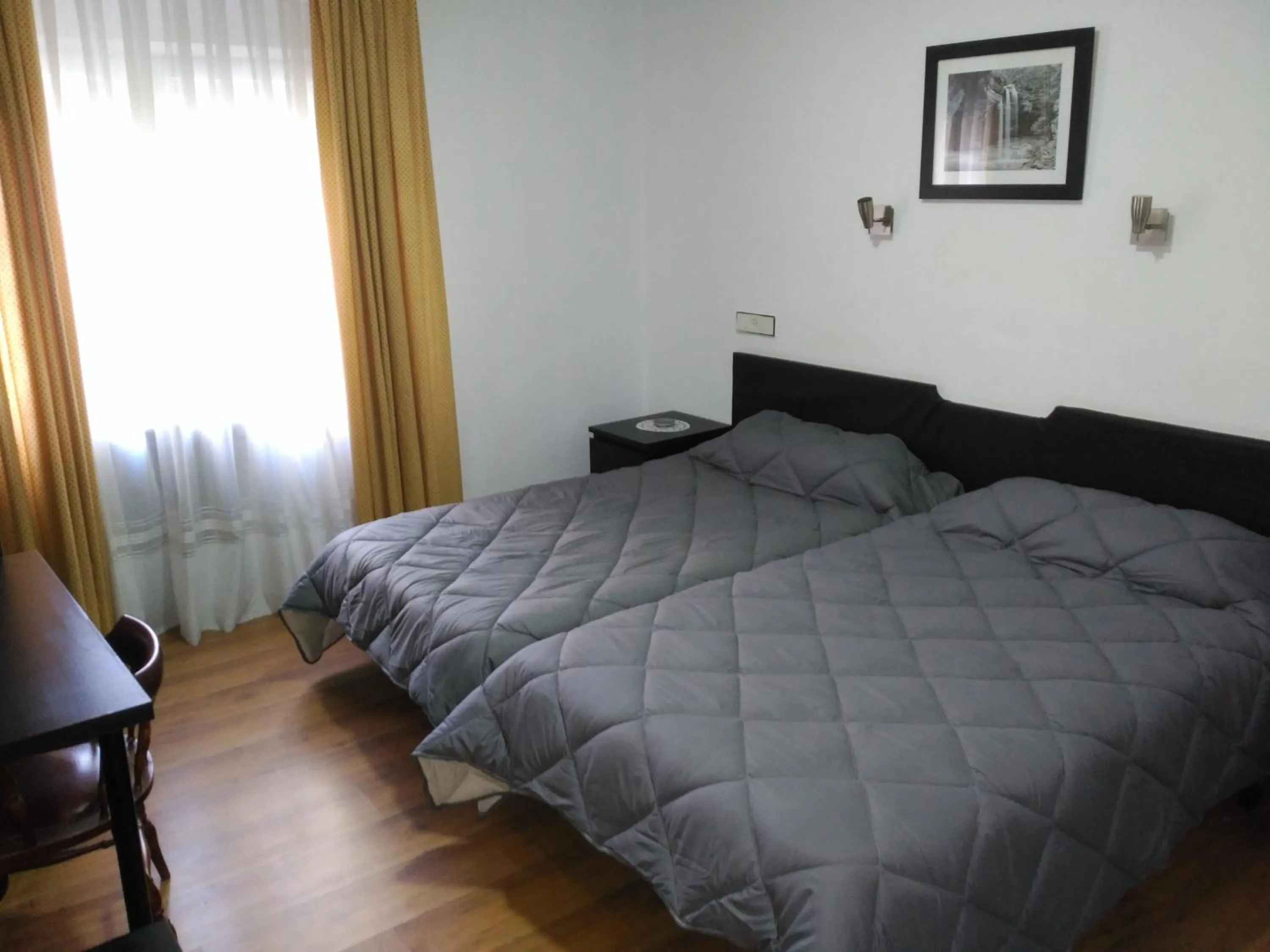 Bed in Hotel Vaqueros